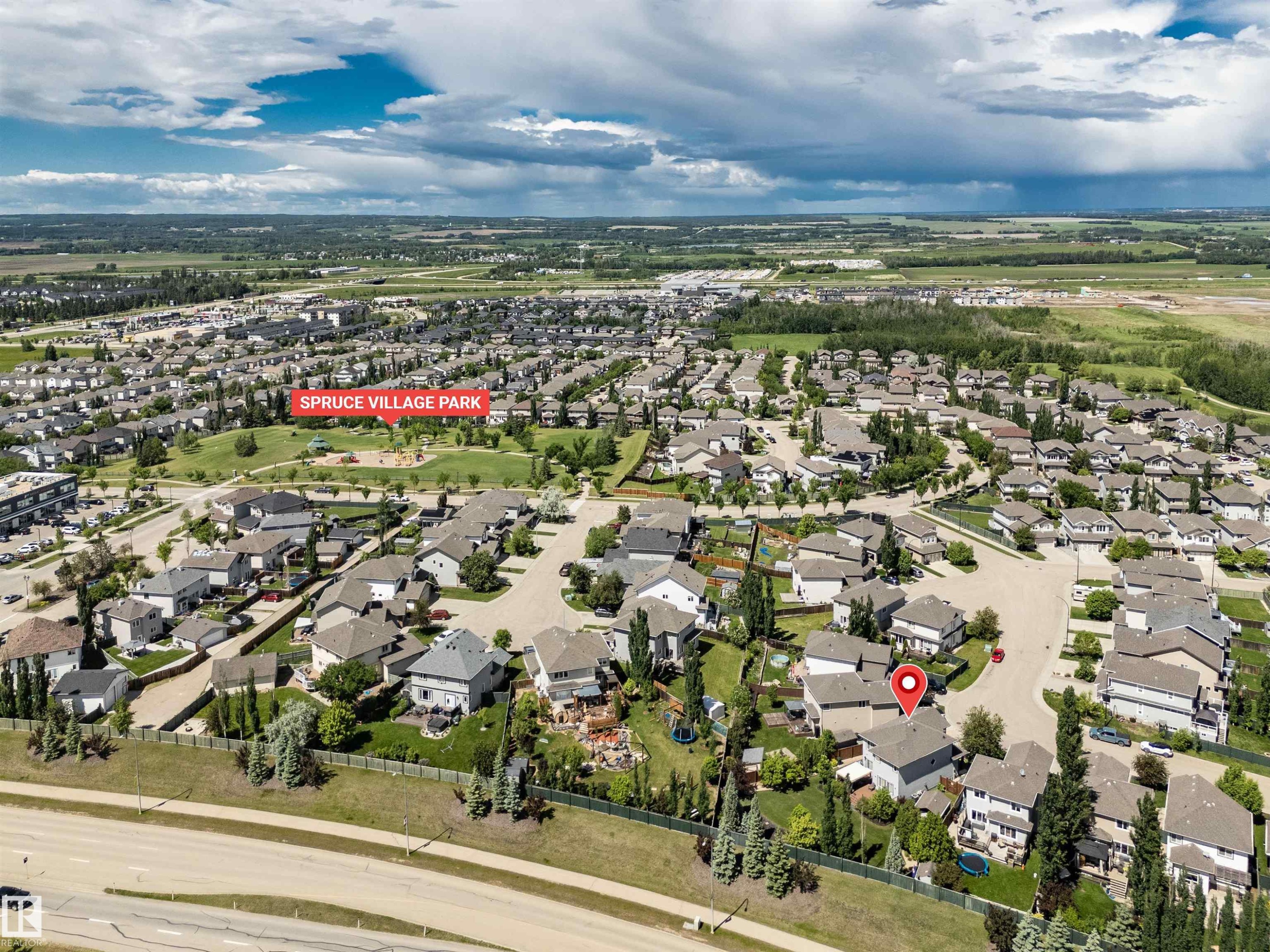Aerial perspective showcasing a residential neighborhood with a variety of detached homes - 18 Voleta Crest, Spruce Grove, AB
