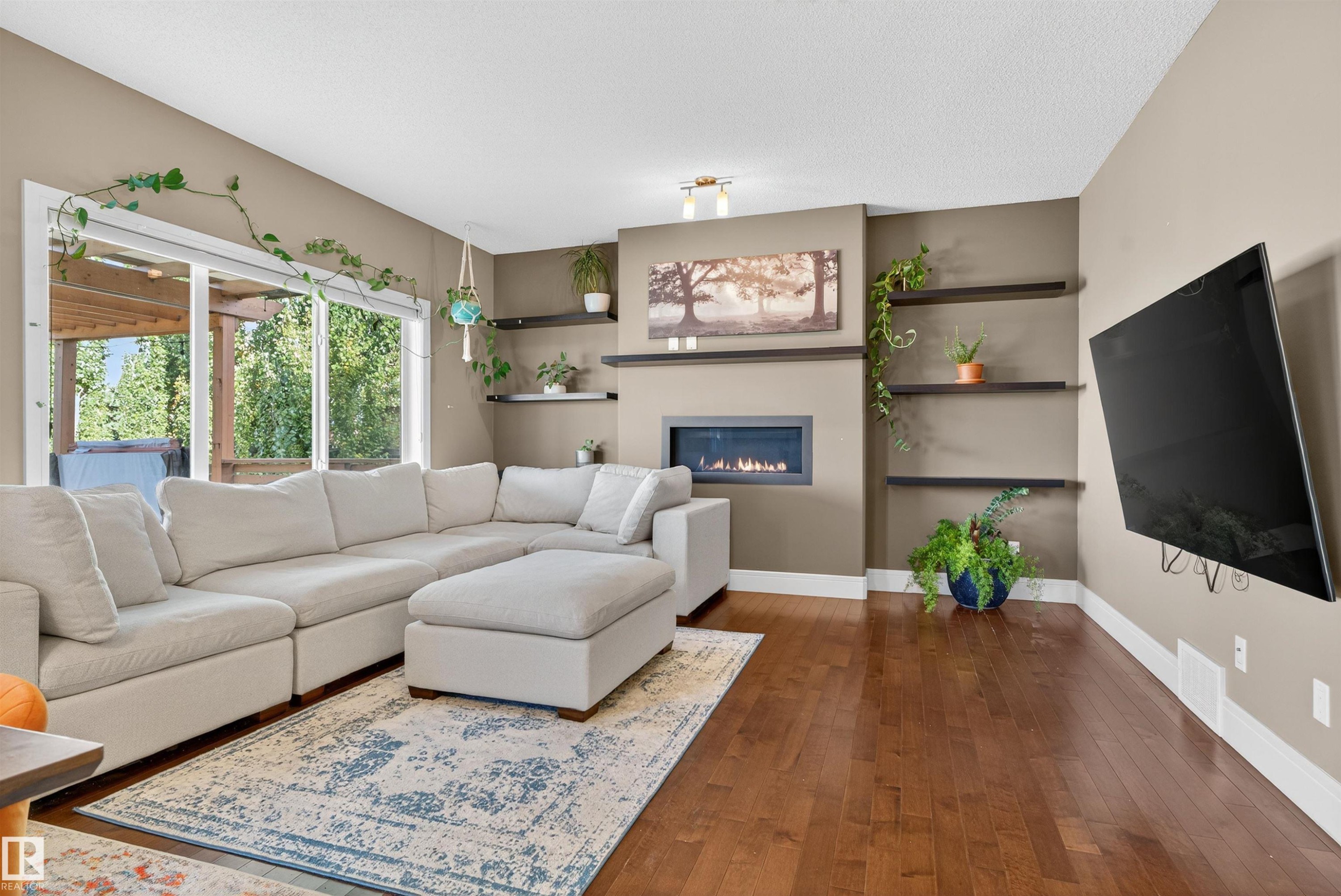 1772 33B Street Nw, Edmonton, AB - Indoor Photo Showing Living Room With Fireplace