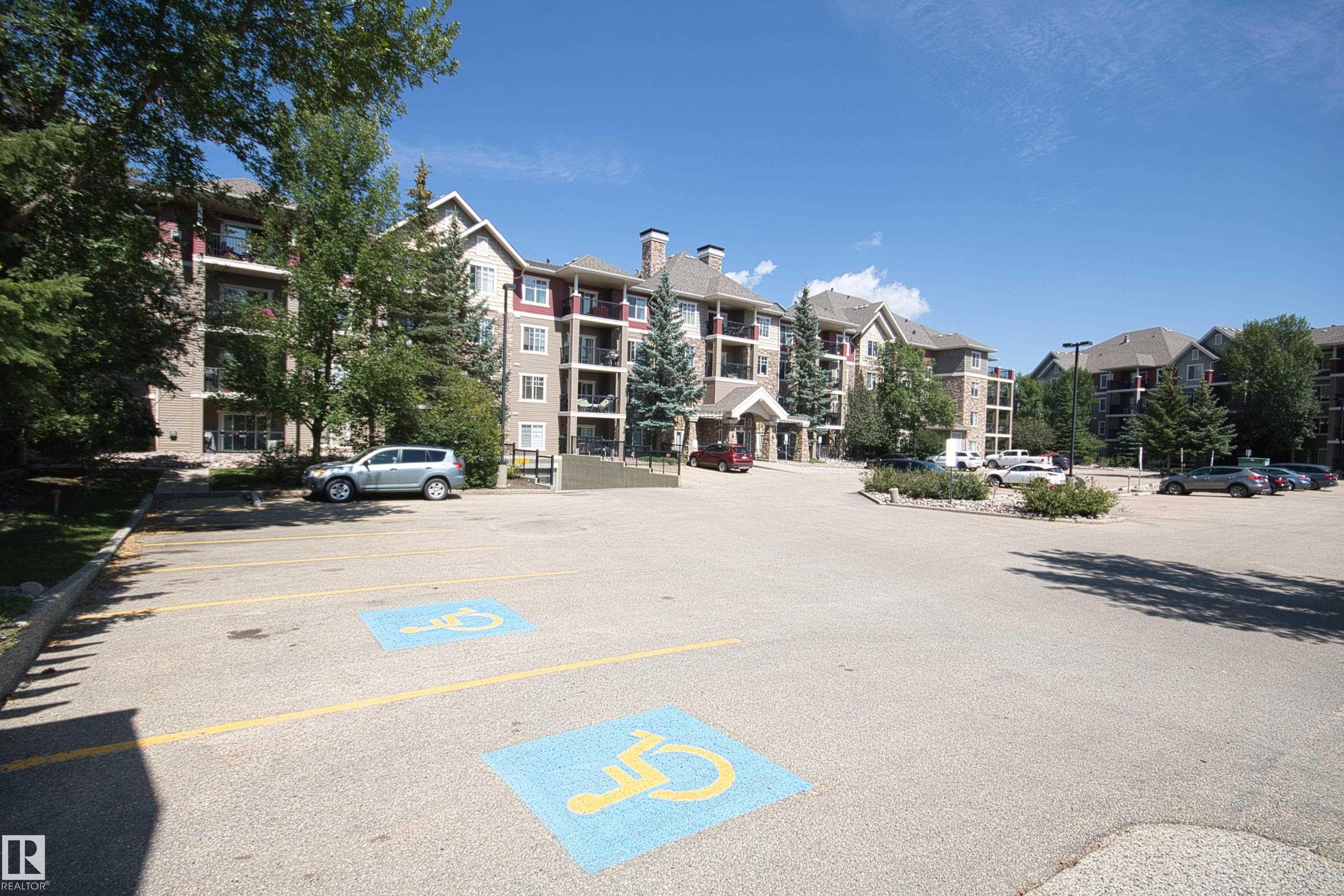 View of uncovered parking lot - 311 2098 Blackmud Creek Drive, Edmonton, AB