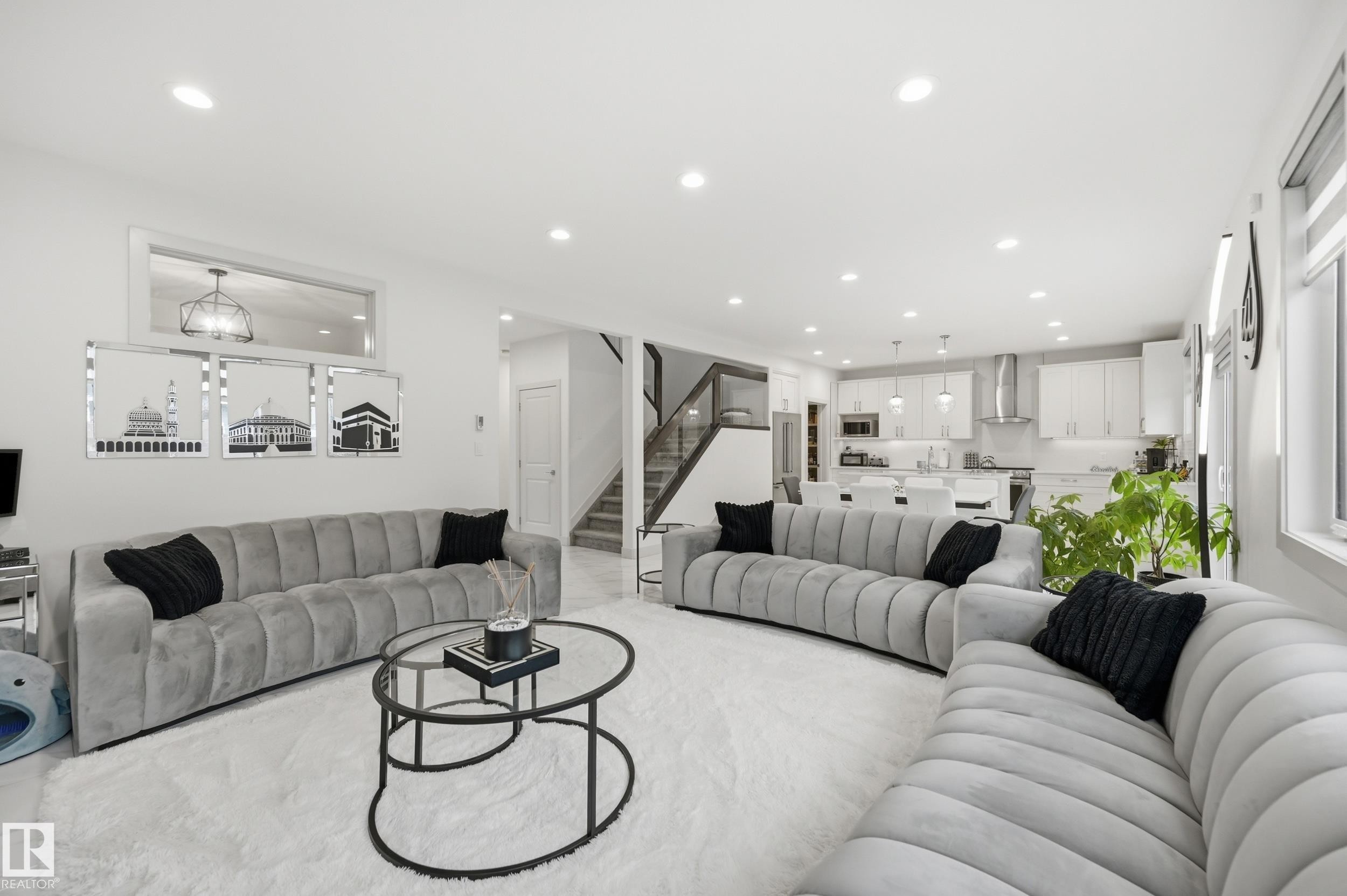Open-concept living space with recessed lighting and light-toned flooring - 76 Jacobs Close, St. Albert, AB