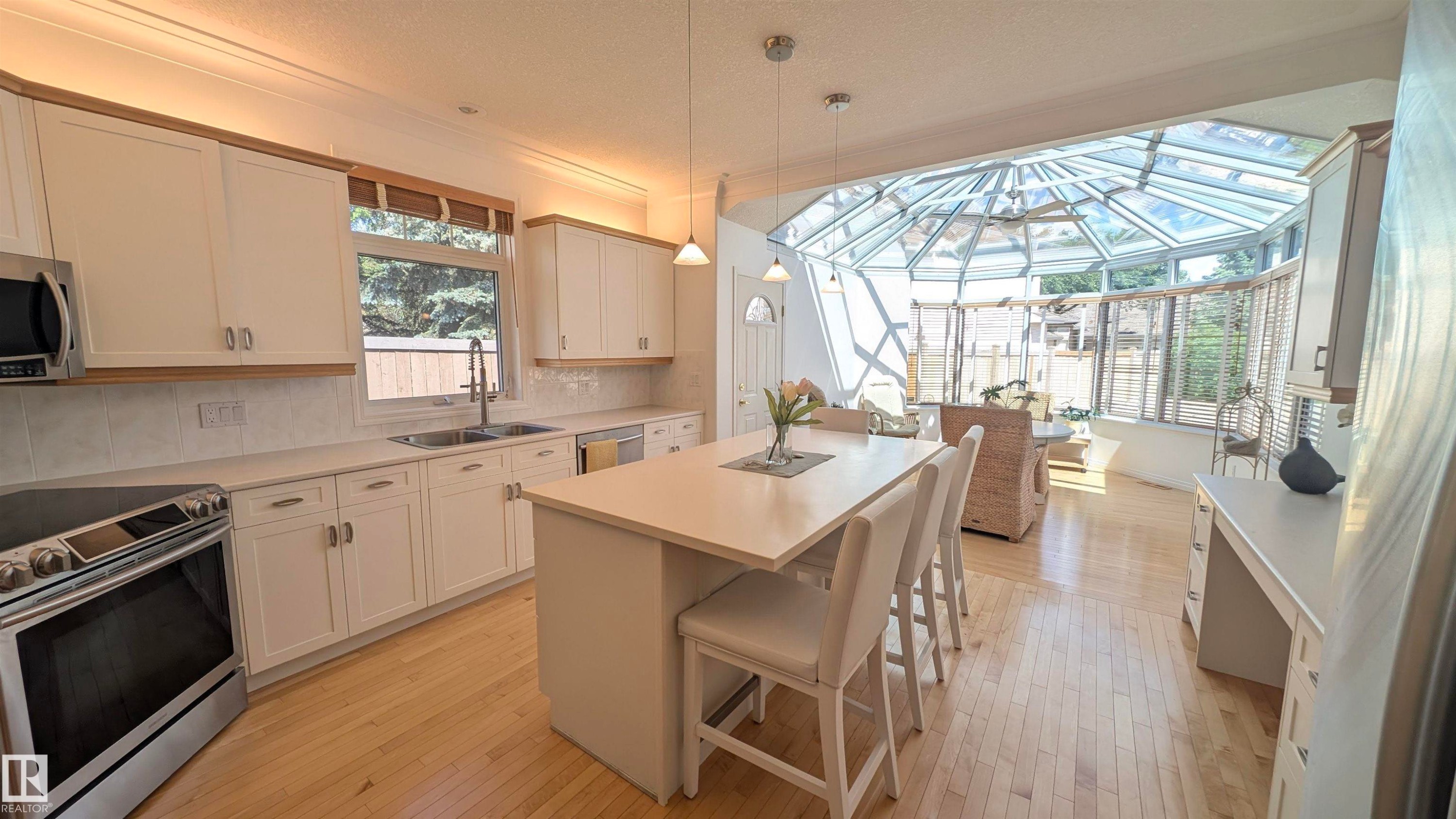 8 Butterworth Point(E) Nw, Edmonton, AB - Indoor Photo Showing Kitchen With Double Sink