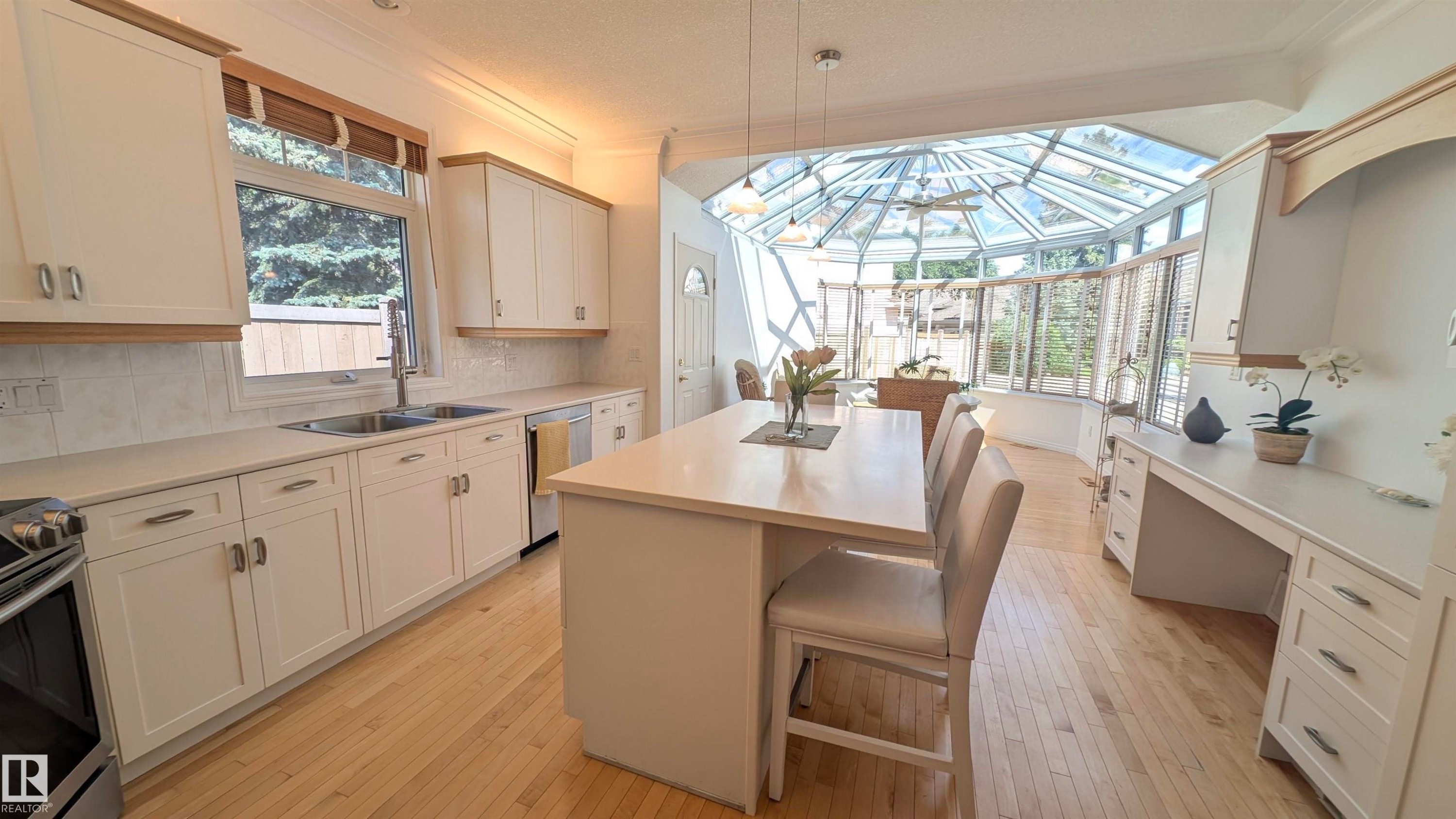 8 Butterworth Point(E) Nw, Edmonton, AB - Indoor Photo Showing Kitchen With Double Sink