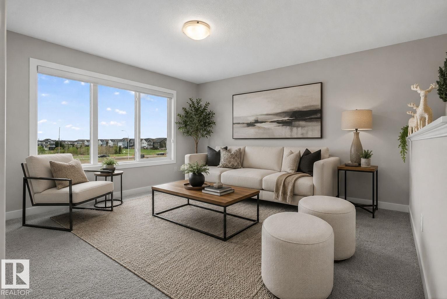 Bright living area featuring large picture windows, a neutral color palette, ceiling lighting, and soft carpet flooring - 7341 Armour Crescent, Edmonton, AB - Indoor Photo Showing Living Room