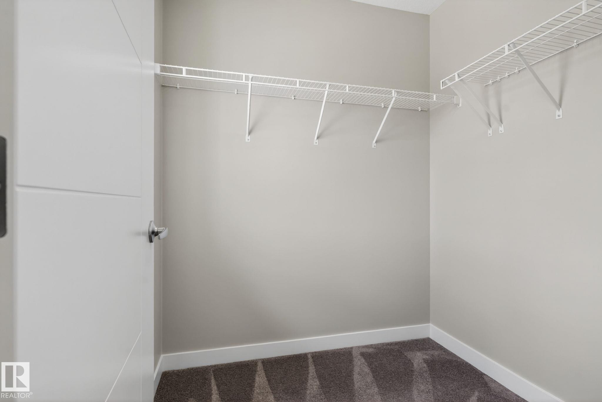 Walk in closet - 7341 Armour Crescent, Edmonton, AB - Indoor With Storage