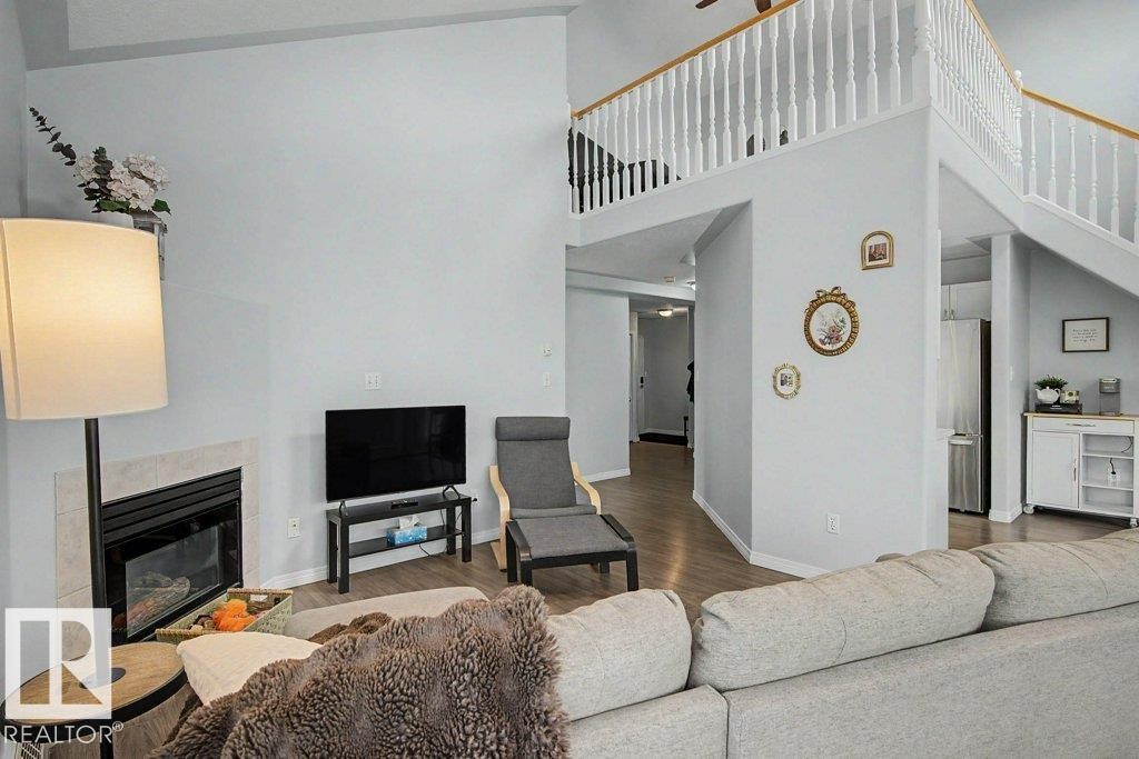 401 10827 85 Avenue, Edmonton, AB - Indoor Photo Showing Living Room With Fireplace