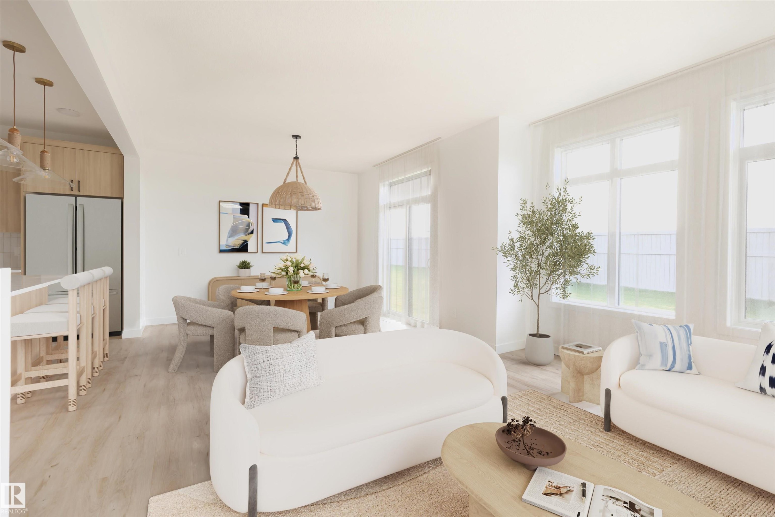 Open-concept living space featuring wood-finish flooring, recessed lighting, and expansive windows - 47 Chartres Close, St. Albert, AB