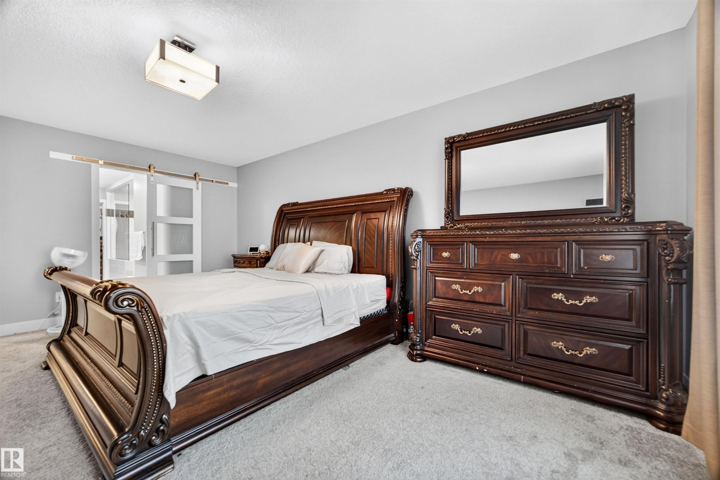 Grey carpeting complements light grey walls - 1603 158 Street, Edmonton, AB