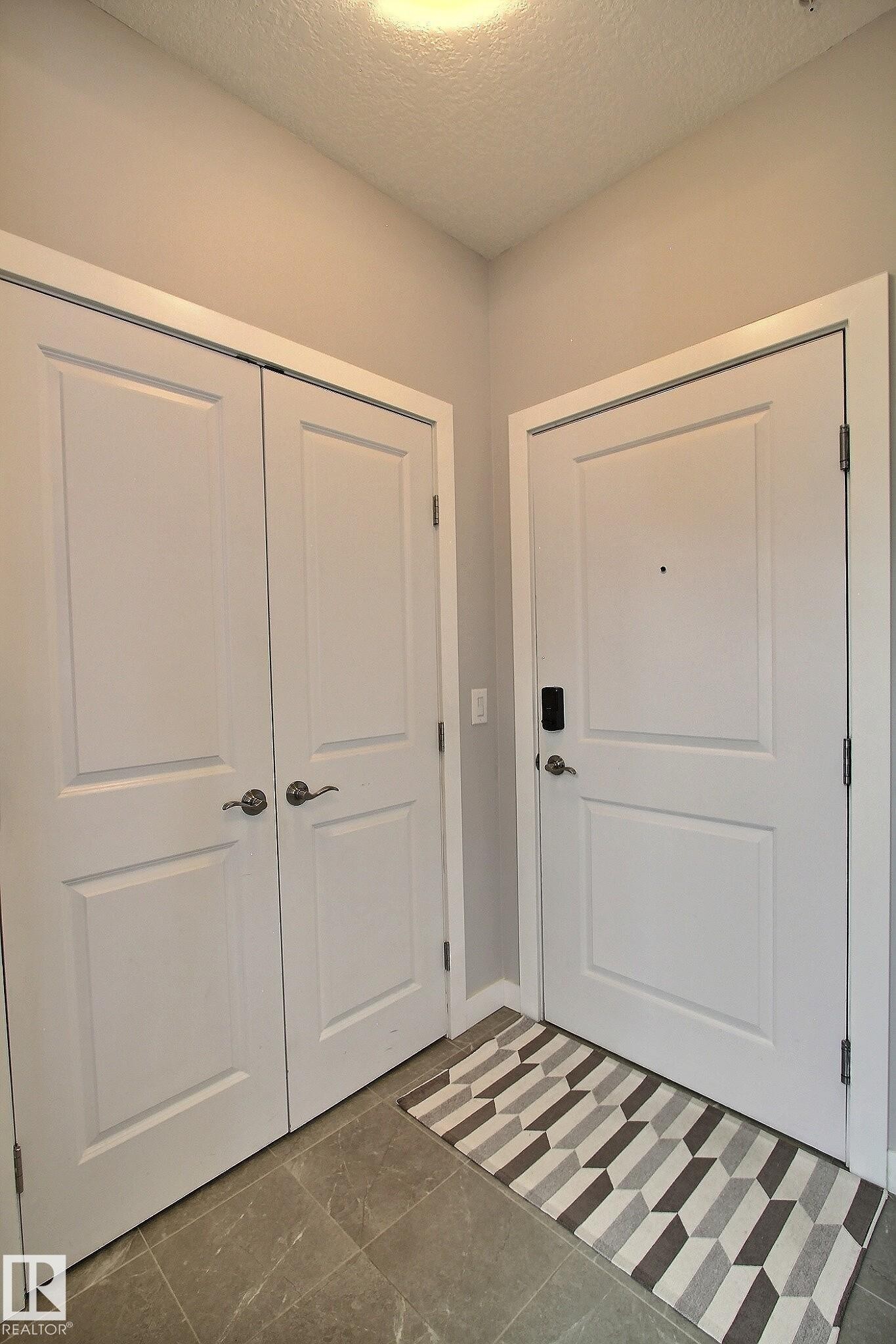 #206 2584 Anderson Wy Sw, Edmonton, AB - Indoor Photo Showing Other Room