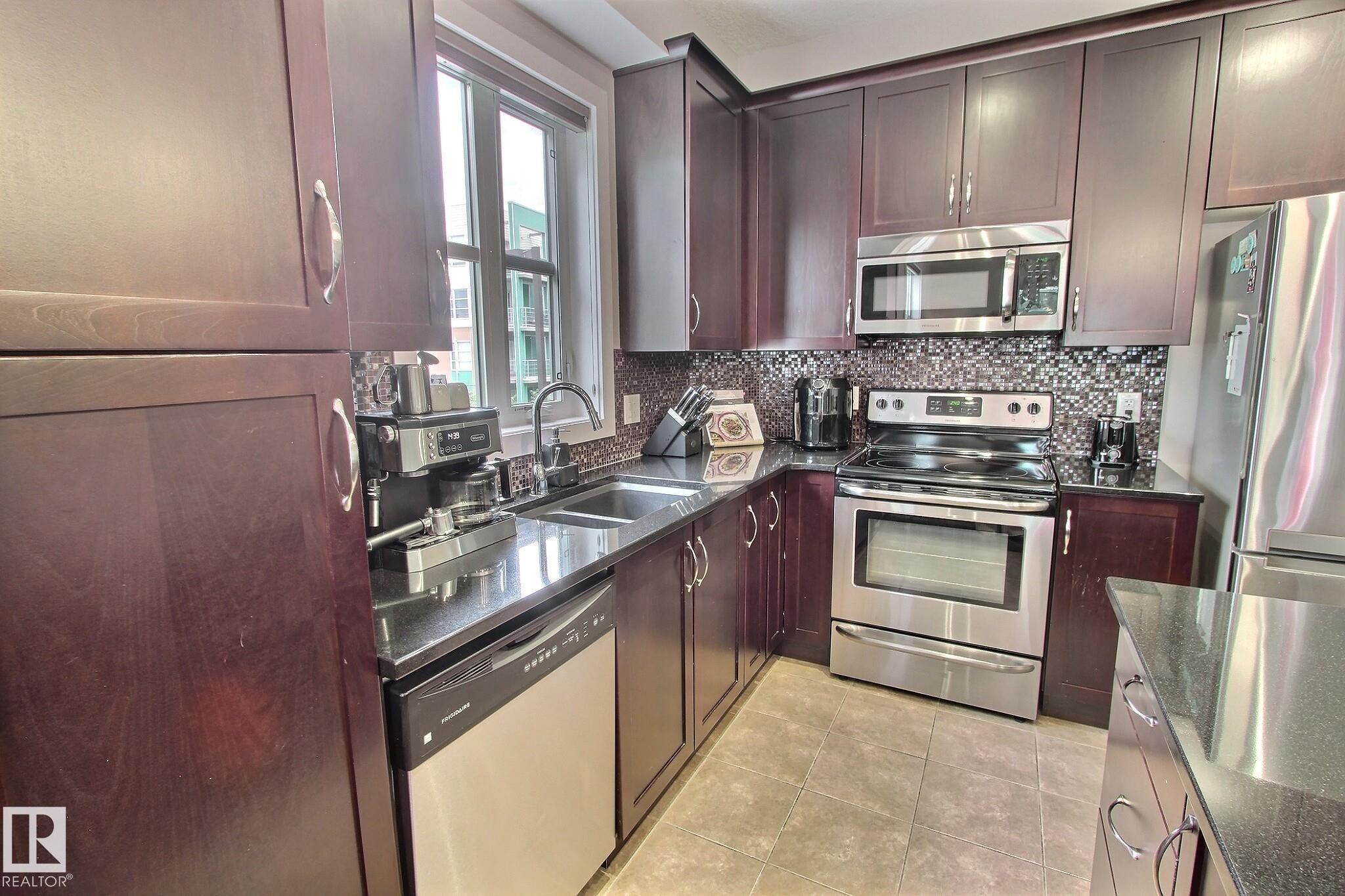 #206 2584 Anderson Wy Sw, Edmonton, AB - Indoor Photo Showing Kitchen With Double Sink