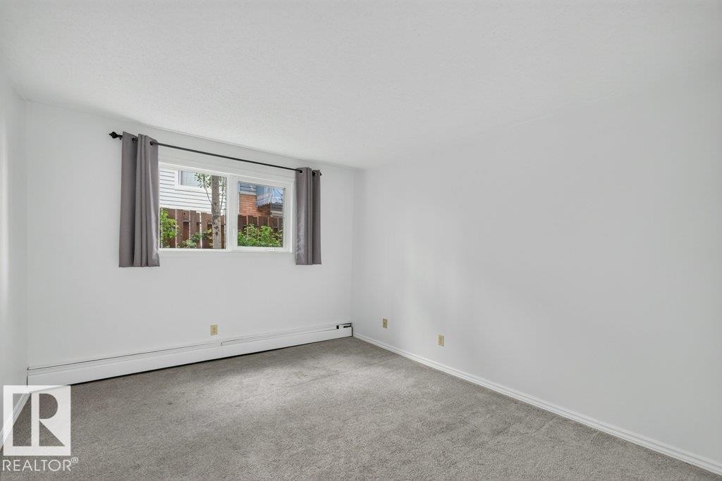 #3 10160 119 St Nw, Edmonton, AB - Indoor Photo Showing Other Room