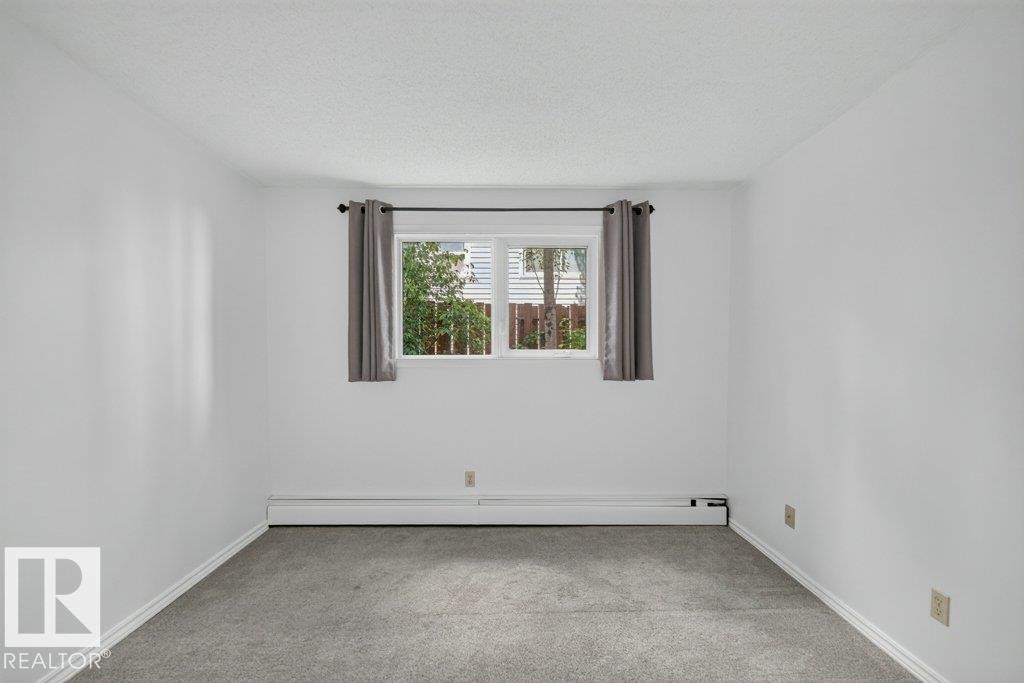 #3 10160 119 St Nw, Edmonton, AB - Indoor Photo Showing Other Room