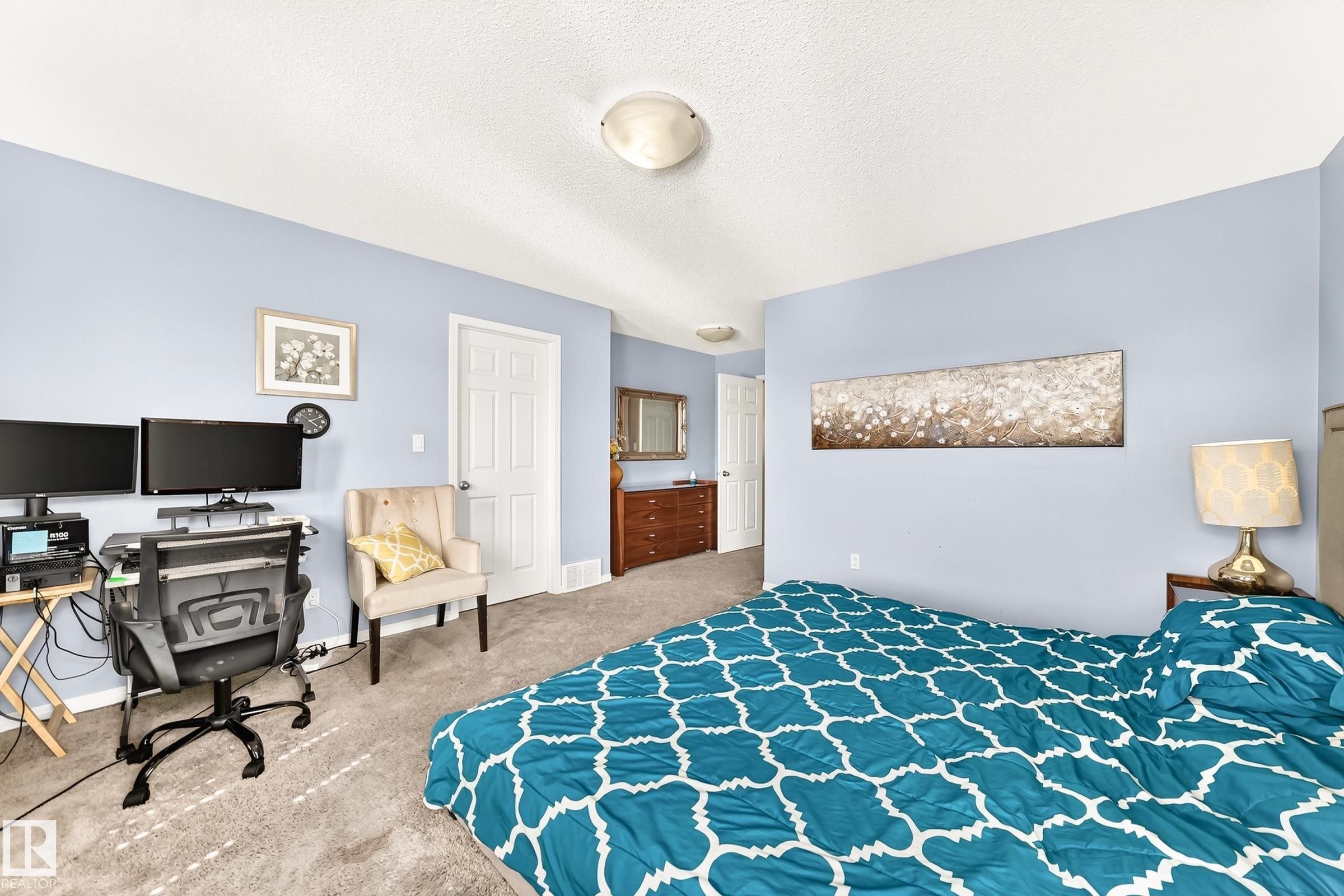 Carpeted bedroom featuring light blue walls and white trim - 875 Chappelle Link Link Sw, Edmonton, AB