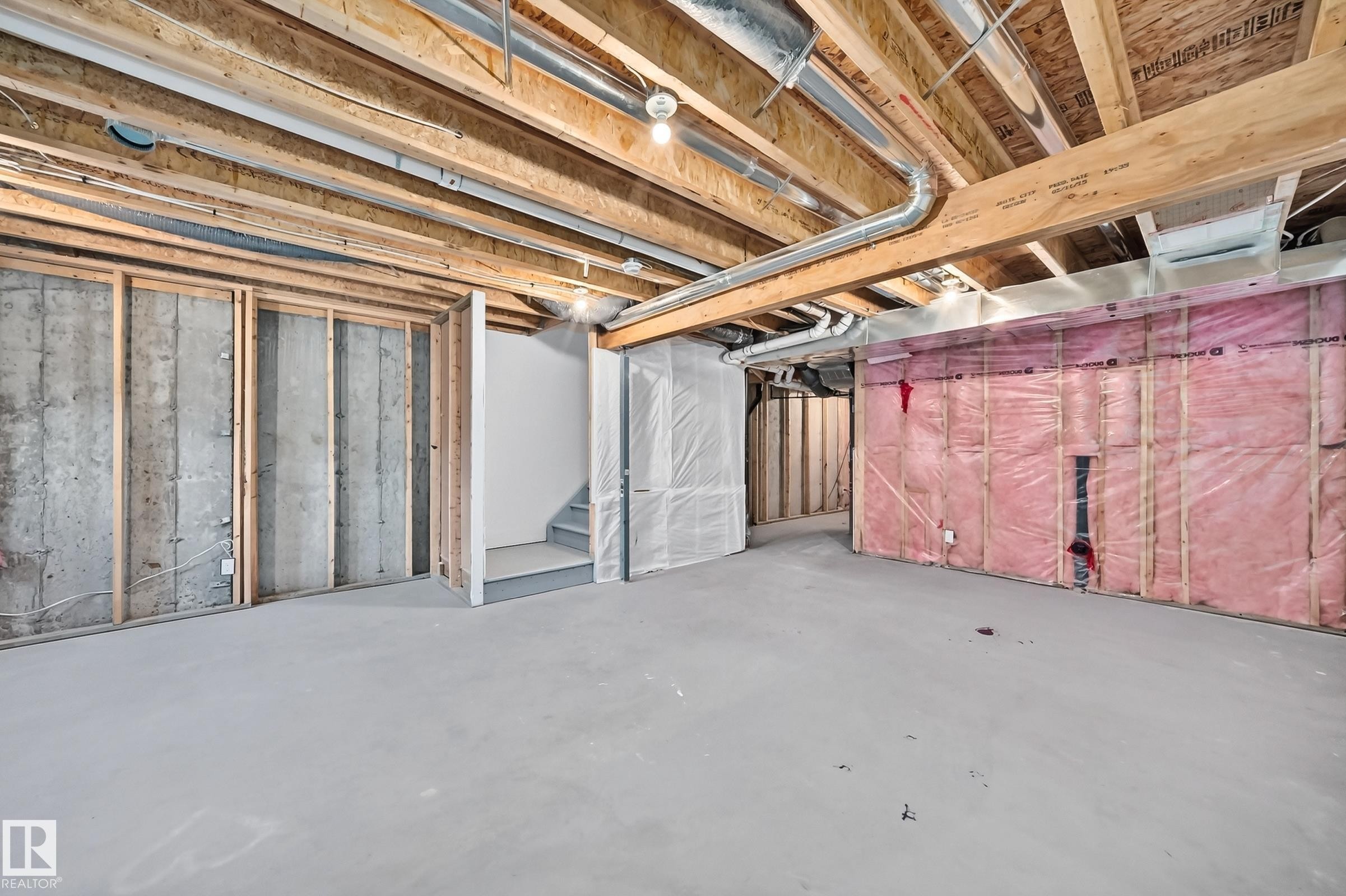 Unfinished basement offering expansive concrete flooring and exposed wooden joists - 2433 Glenridding Boulevard, Edmonton, AB