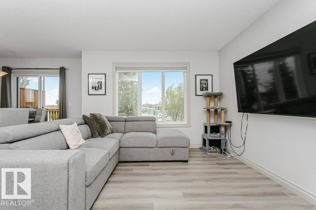 30 445 Brintnell Boulevard, Edmonton, AB - Indoor Photo Showing Living Room