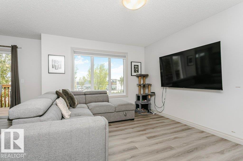 30 445 Brintnell Boulevard, Edmonton, AB - Indoor Photo Showing Living Room