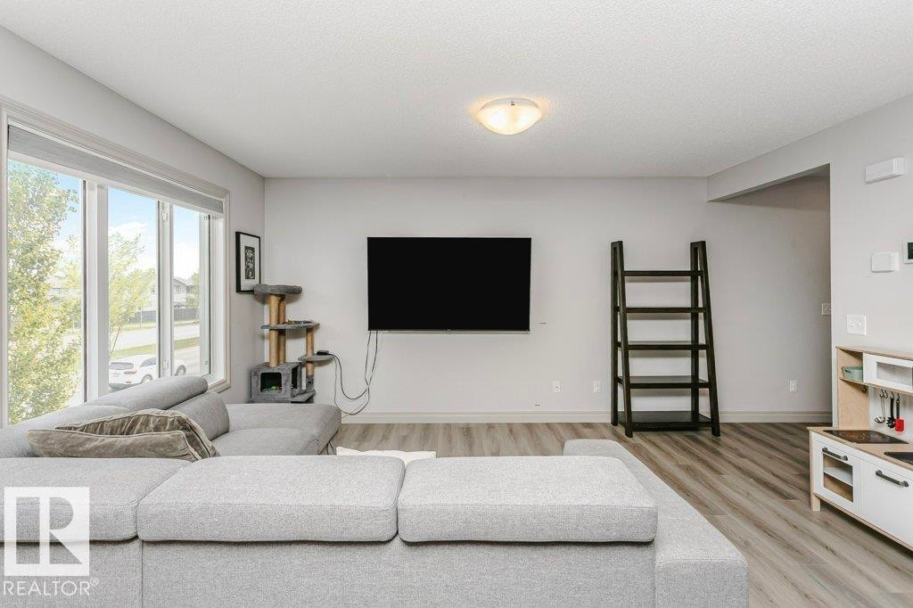 30 445 Brintnell Boulevard, Edmonton, AB - Indoor Photo Showing Living Room