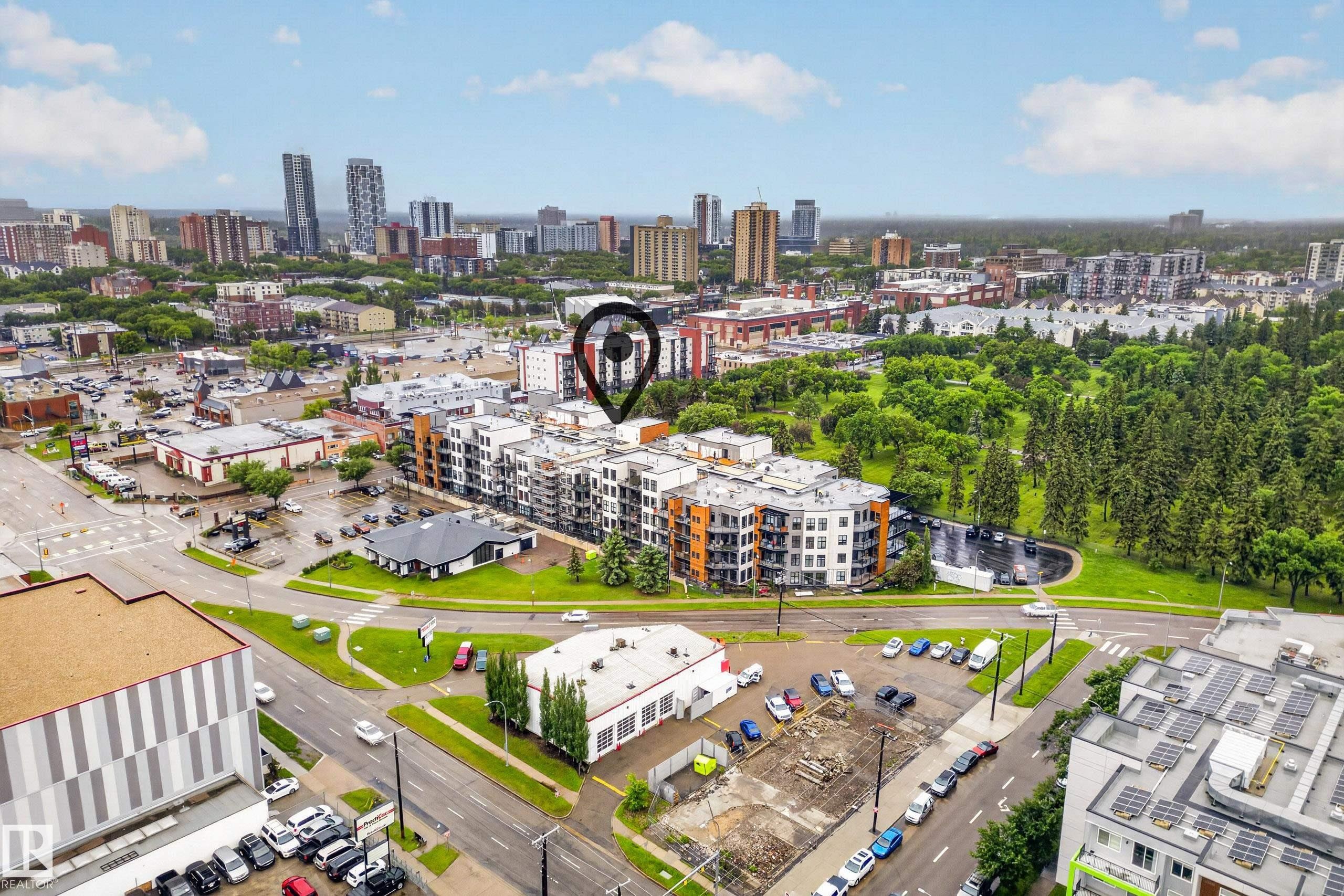 Modern multi-story building featuring balconies and a contemporary facade - #410 10531 117 St Nw, Edmonton, AB