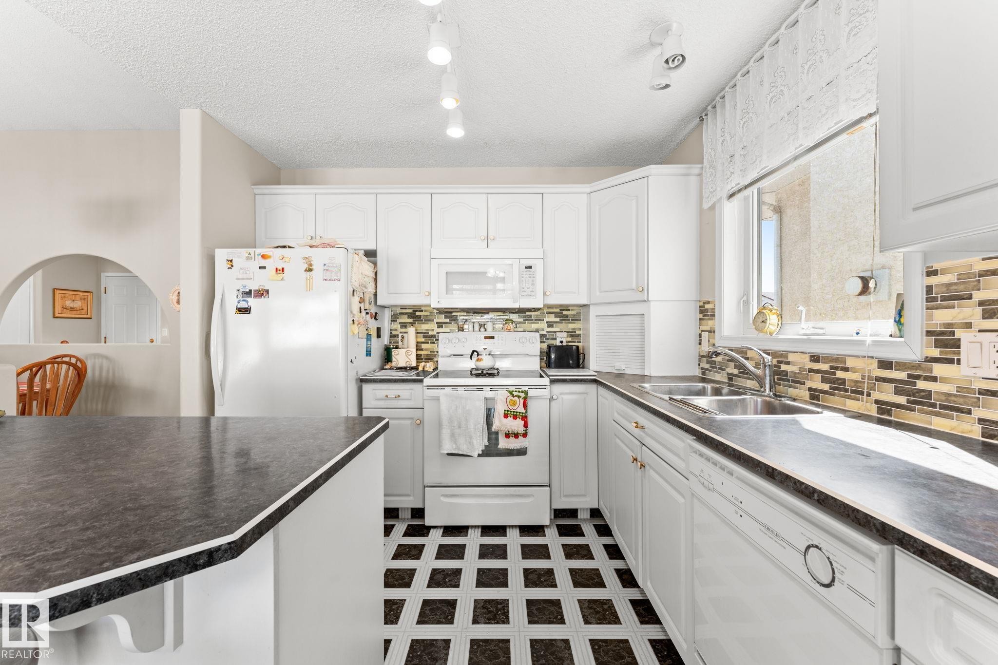 13308 155 Avenue Nw, Edmonton, AB - Indoor Photo Showing Kitchen With Double Sink