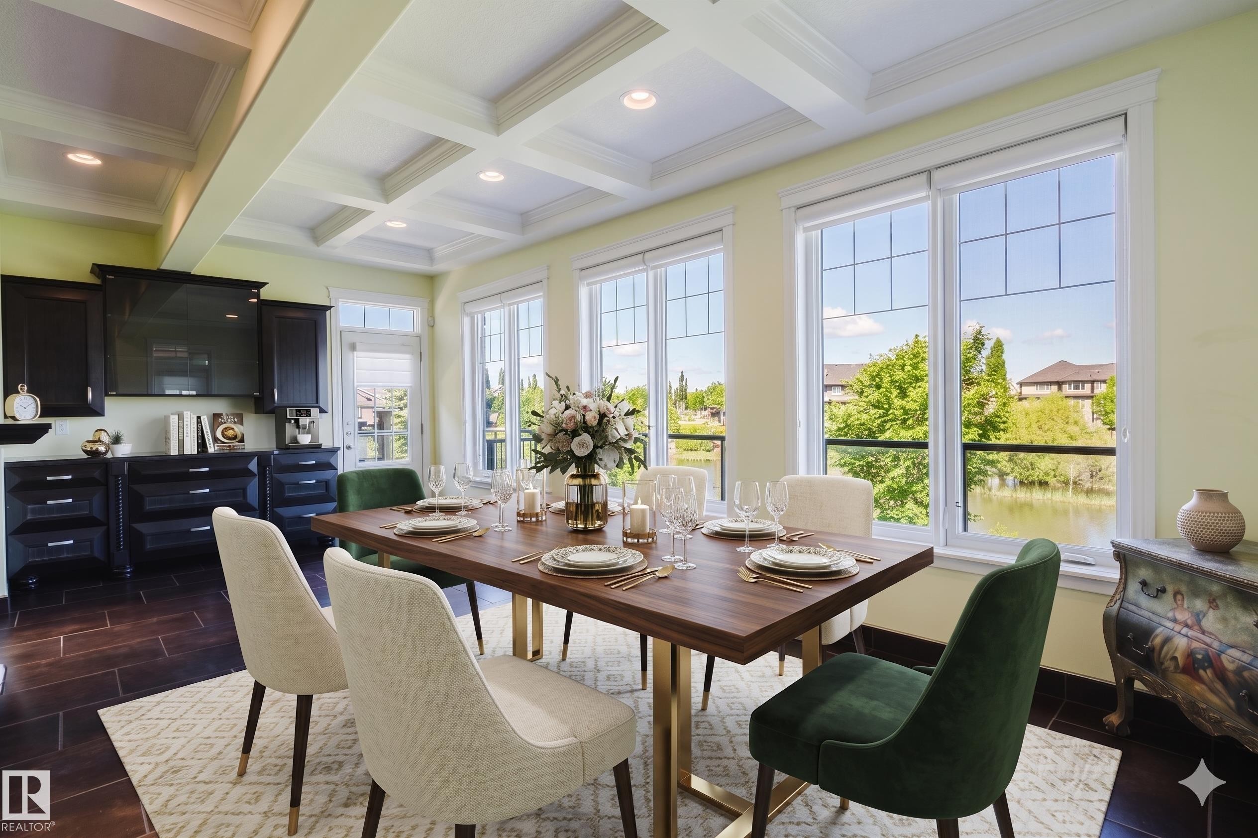 Dining area featuring large windows with a water backdrop - 3438 West Landing Landing, Edmonton, AB