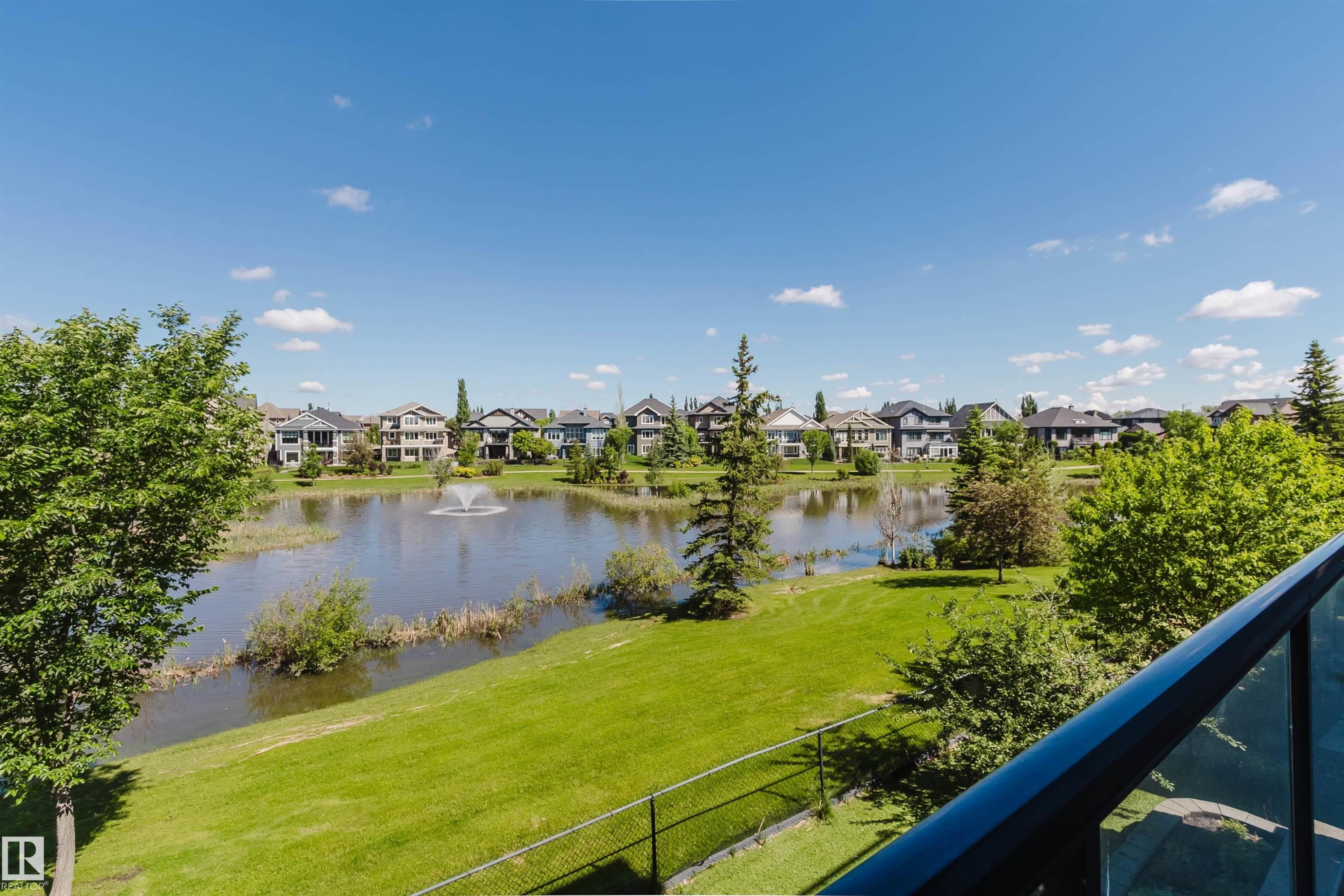 Expansive water feature with central fountain - 3438 West Landing Landing, Edmonton, AB