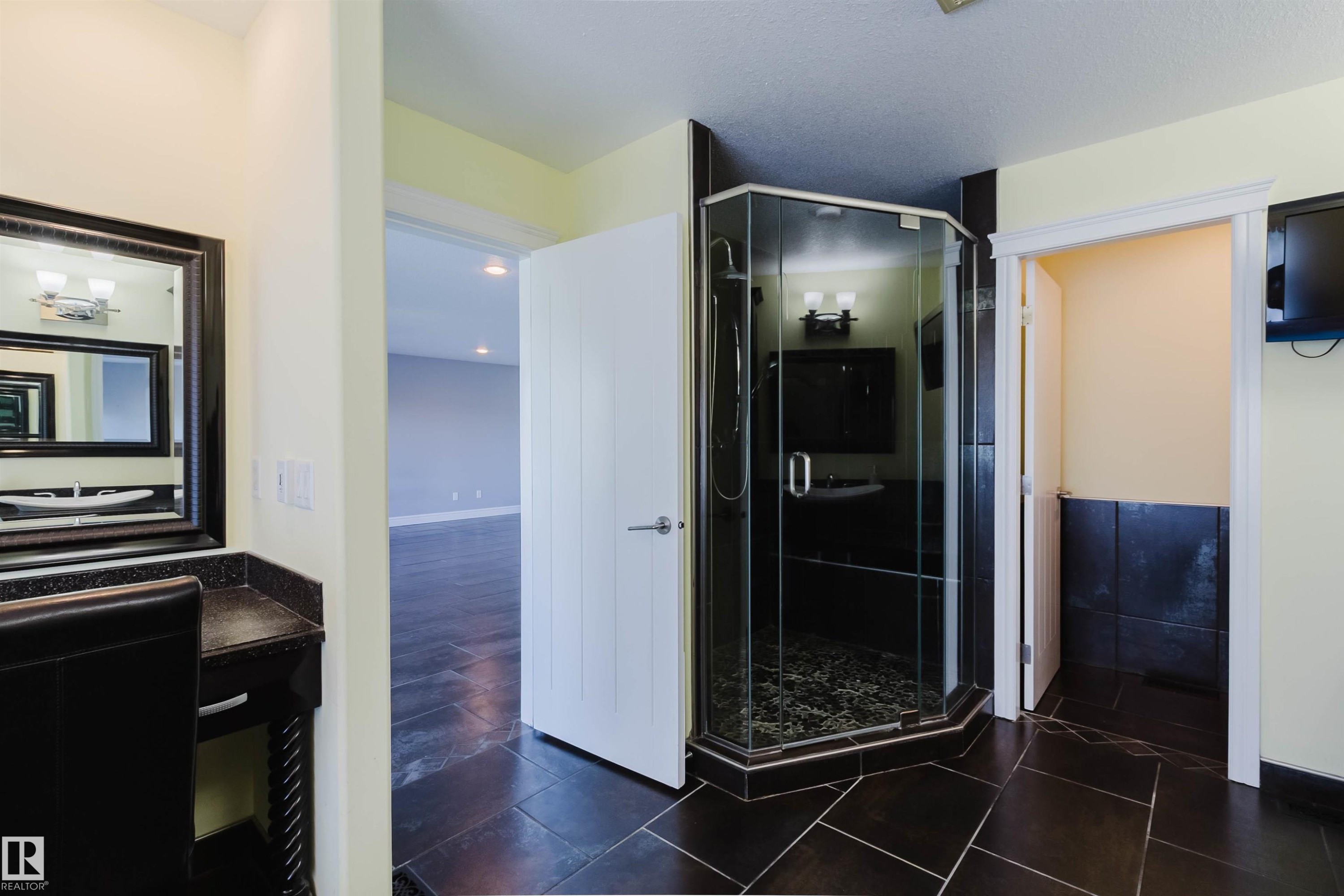 Black tile flooring spanning the space - 3438 West Landing Landing, Edmonton, AB