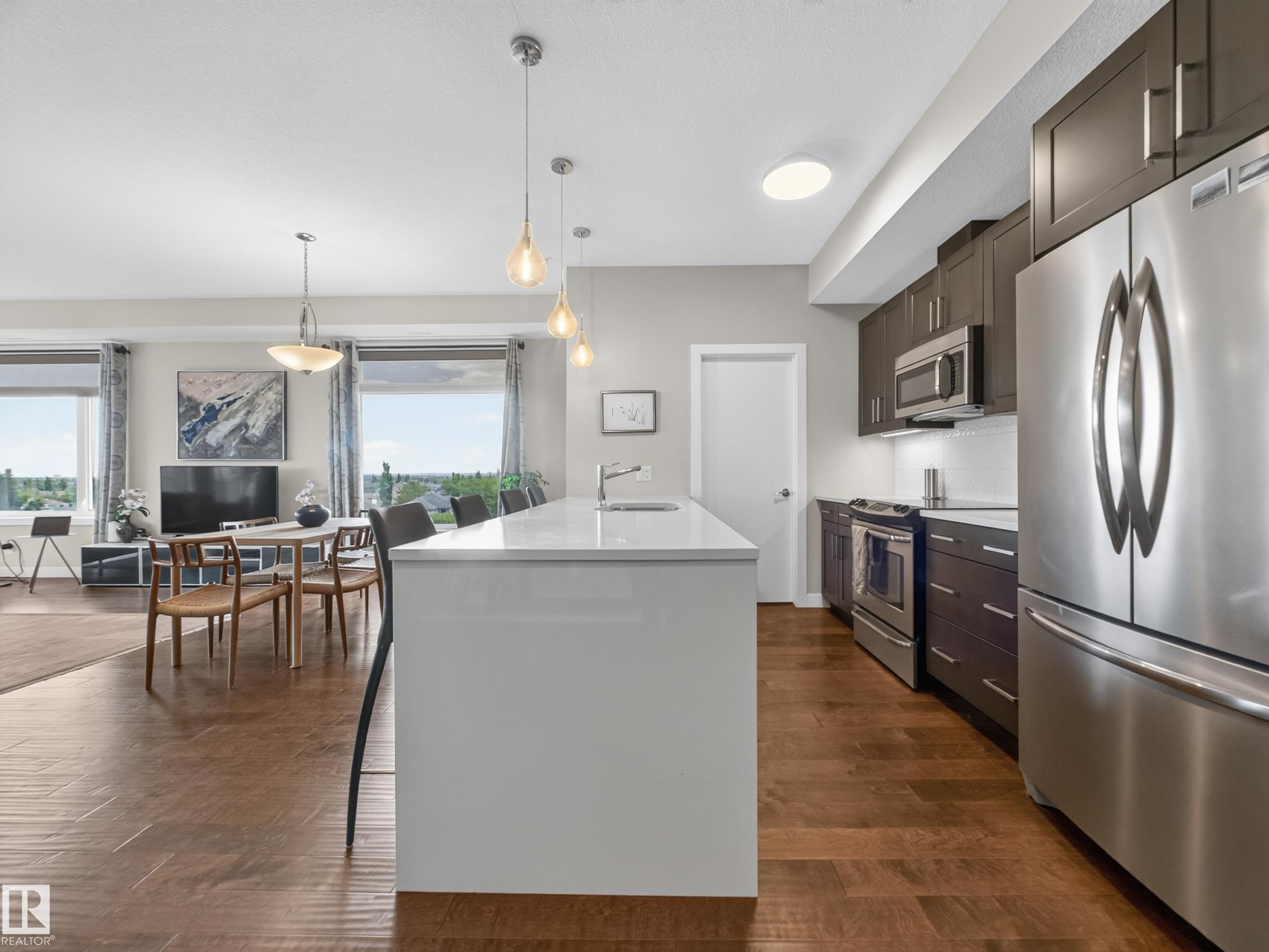 #412 625 Leger Wy Nw, Edmonton, AB - Indoor Photo Showing Kitchen With Stainless Steel Kitchen With Upgraded Kitchen