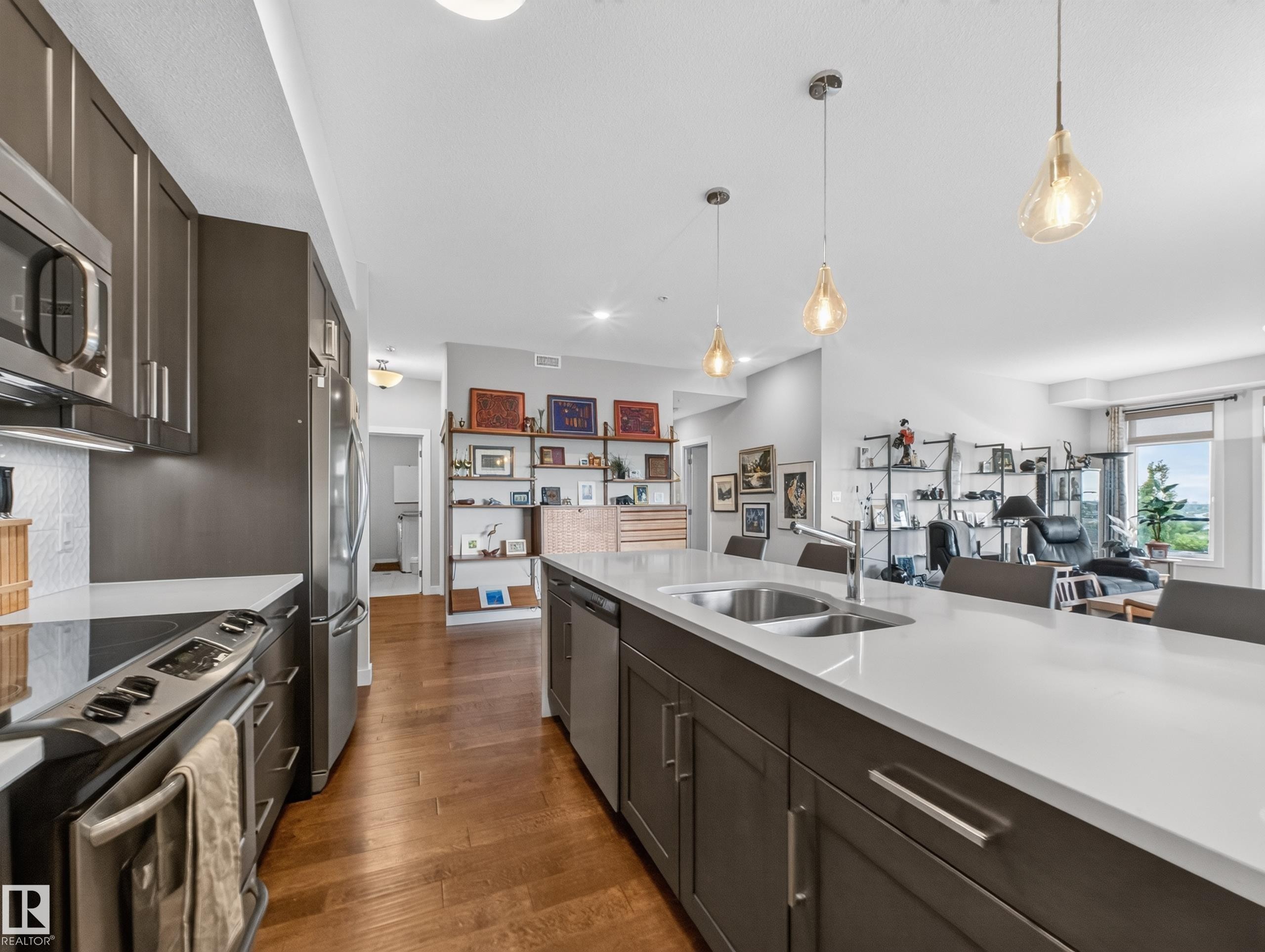 #412 625 Leger Wy Nw, Edmonton, AB - Indoor Photo Showing Kitchen With Stainless Steel Kitchen With Double Sink With Upgraded Kitchen
