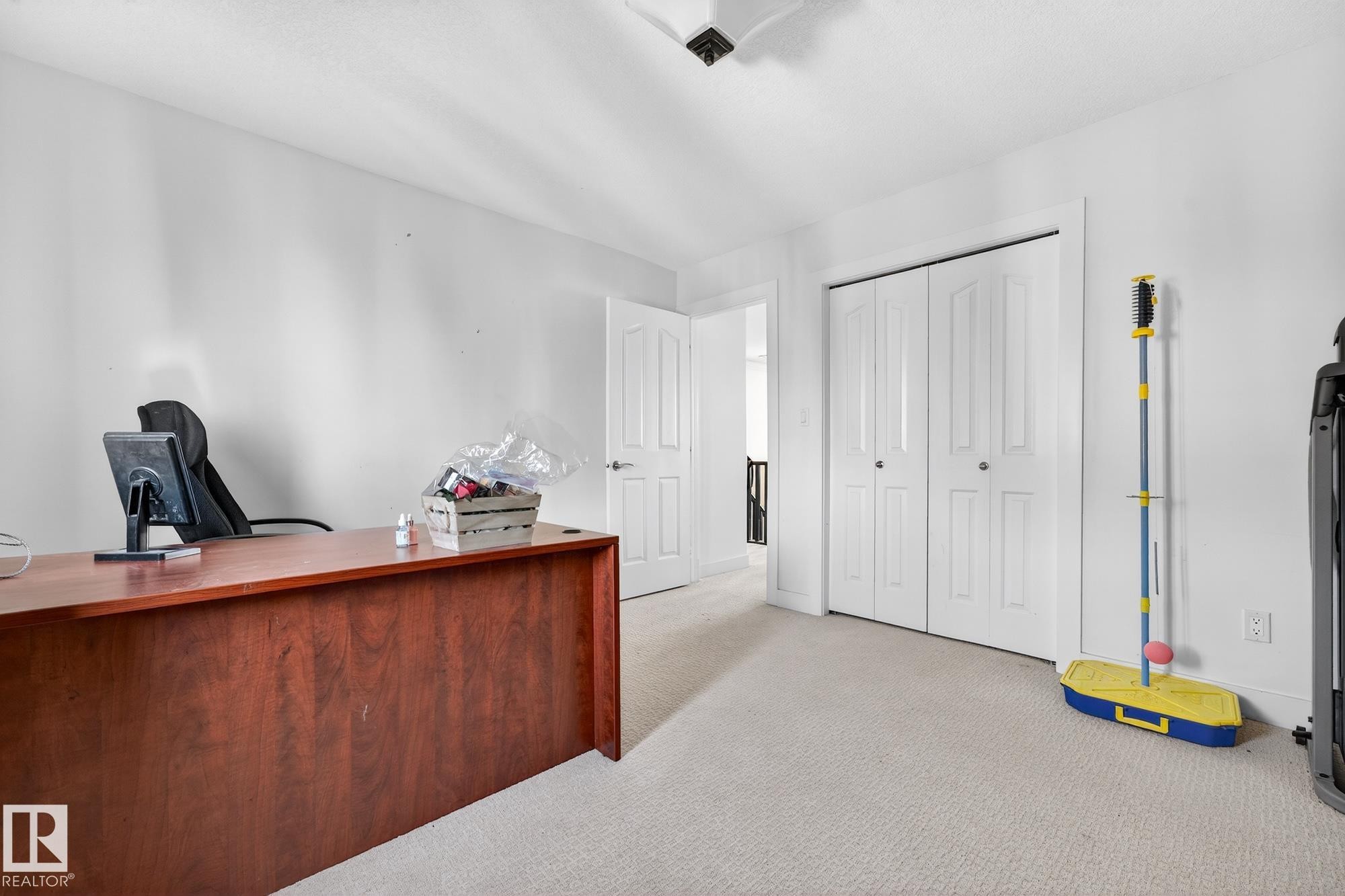 Office area with light colored carpet and baseboards - 1660 Malone Way, Edmonton, AB