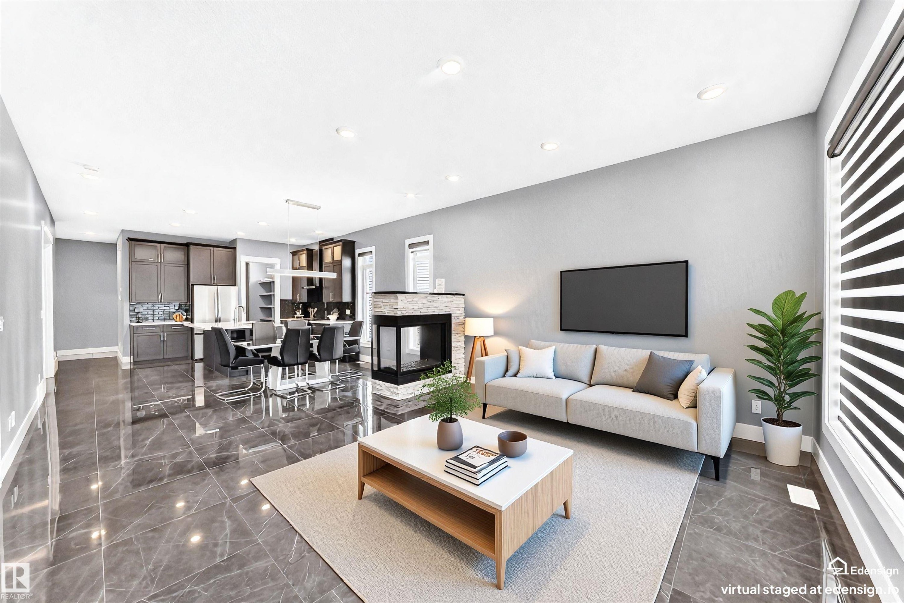 Open-concept living area featuring large format gray marble-look tile flooring, recessed lighting, a modern fireplace with a light stone surround, and floor-to-ceiling windows with horizontal blinds - 1781 Melrose Crescent, Edmonton, AB