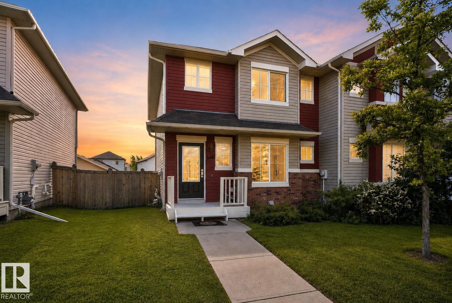 Two-story home with a red and beige exterior facade - 545 Watt Boulevard Sw, Edmonton, AB - Outdoor