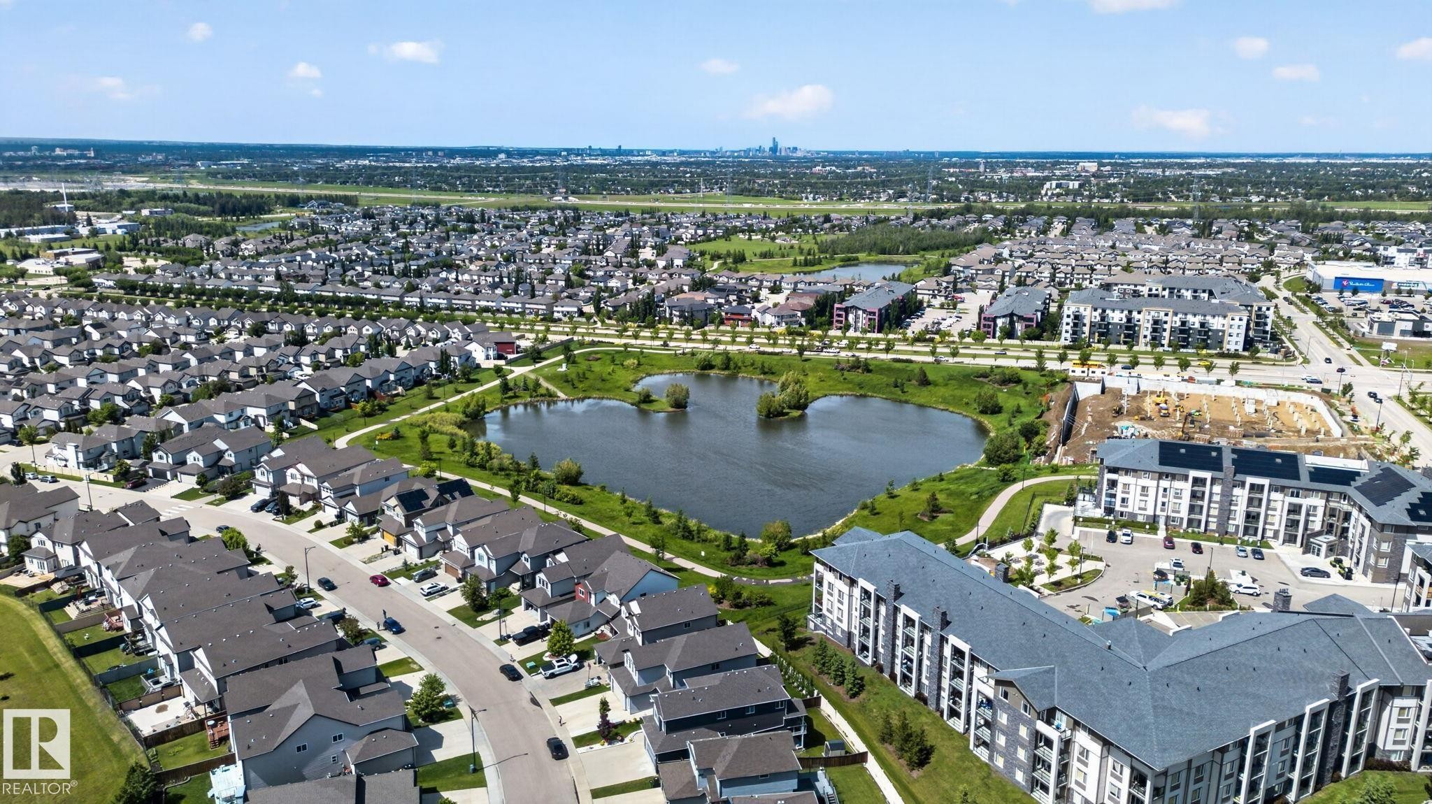 Aerial perspective showcasing a residential area with varied housing types - 545 Watt Boulevard Sw, Edmonton, AB - Outdoor With View