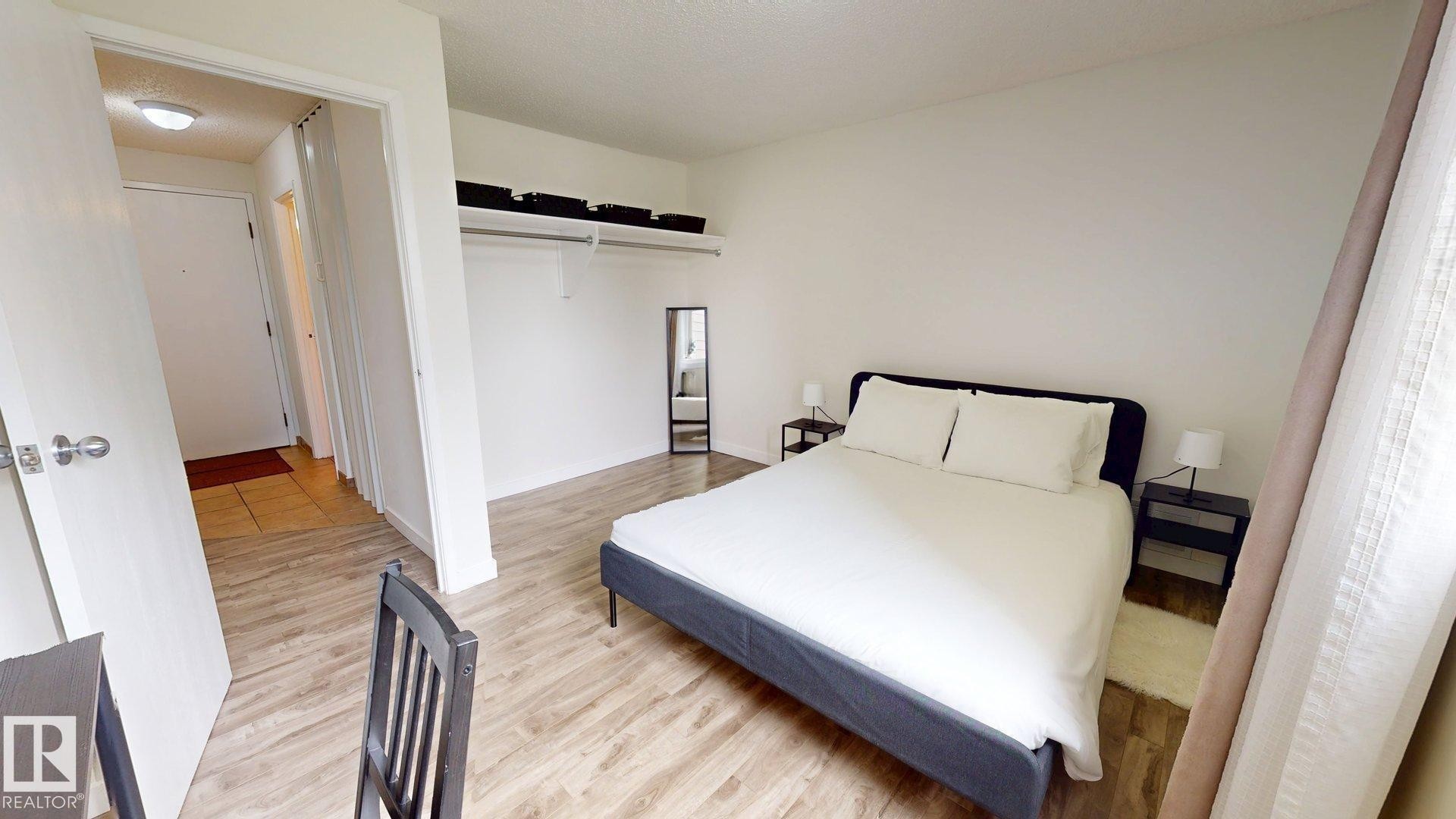 #207 11224 116 St Nw, Edmonton, AB - Indoor Photo Showing Bedroom
