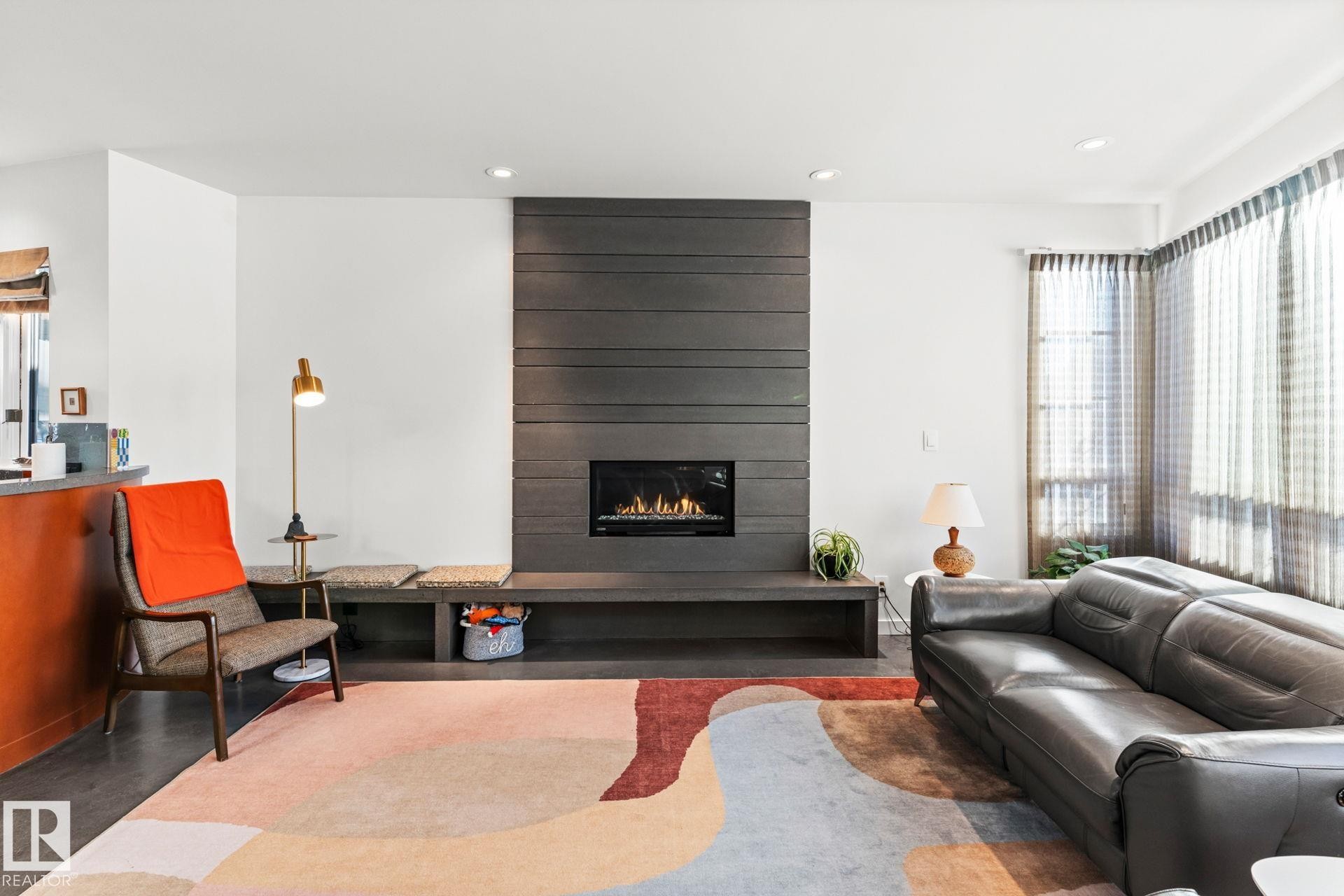 6428 Ada Boulevard Nw, Edmonton, AB - Indoor Photo Showing Living Room With Fireplace