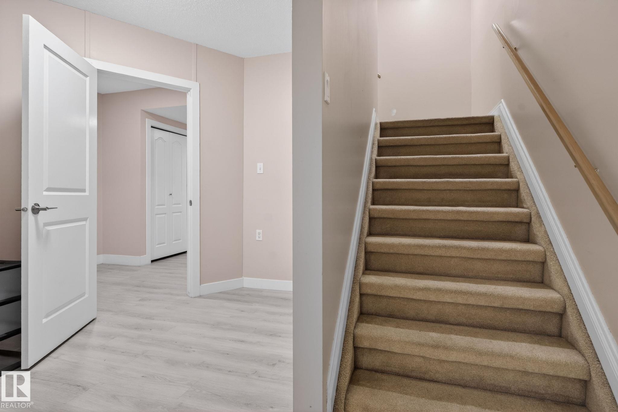 Carpeted staircase with a light wood handrail - 4615 43A Avenue, Edmonton, AB - Indoor Photo Showing Other Room