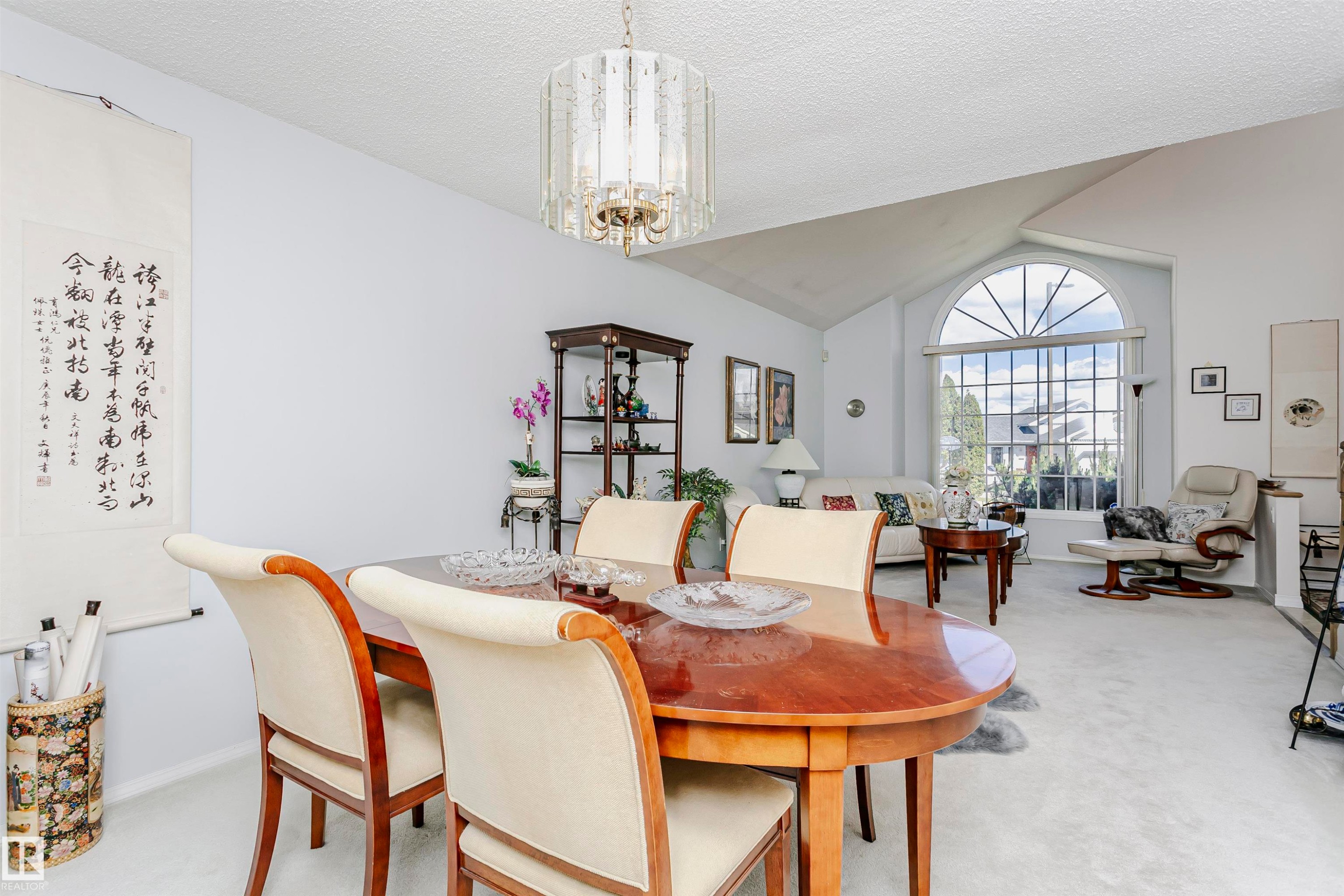 Dining area with a wood-finish table and upholstered chairs - 11023 11A Avenue Nw, Edmonton, AB - Indoor Photo Showing Dining Room
