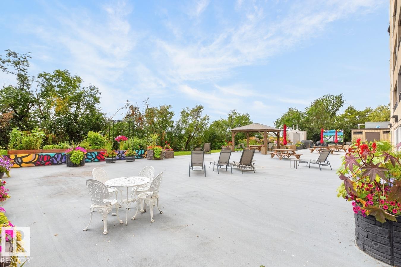 What if you want to take that party outside? No problem! Lounge chairs, picnic tables, gazebo and garden and 3 BBQ’s! - #602 12303 Jasper Av Nw, Edmonton, AB - Outdoor