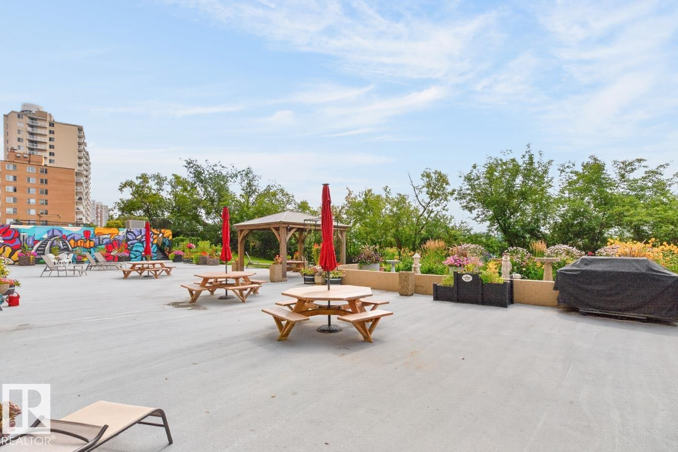 What if you want to take that party outside? No problem! Lounge chairs, picnic tables, gazebo and garden and 3 BBQ’s! - #602 12303 Jasper Av Nw, Edmonton, AB - Outdoor