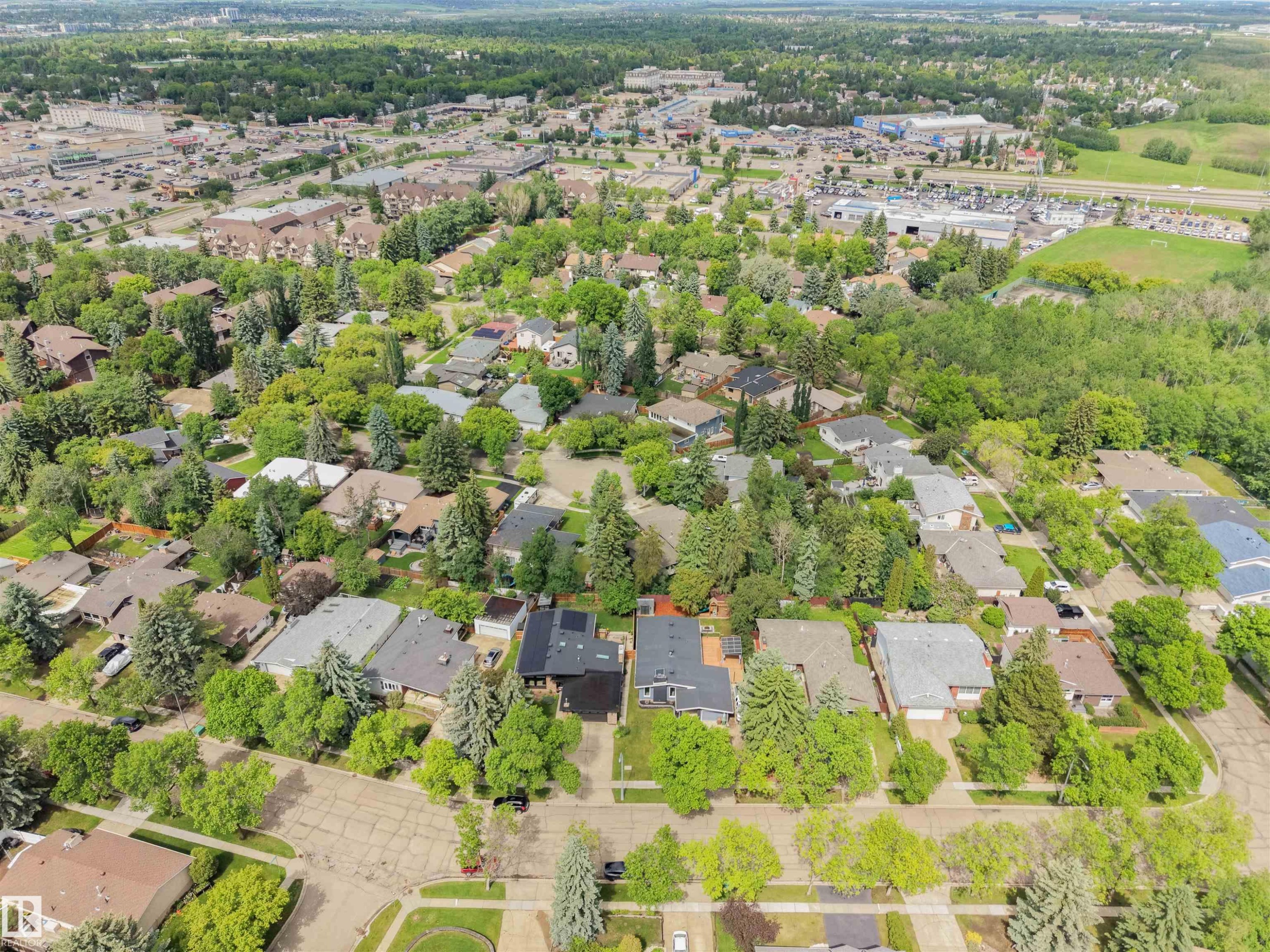 Residential neighborhood with mature trees and established homes - 28 Goodridge Drive, St. Albert, AB
