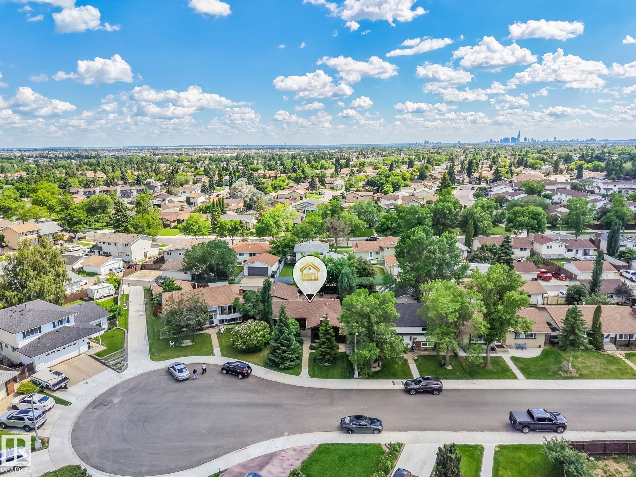 Aerial perspective of a suburban neighborhood featuring residential properties with established landscaping - 17237 104 Street, Edmonton, AB