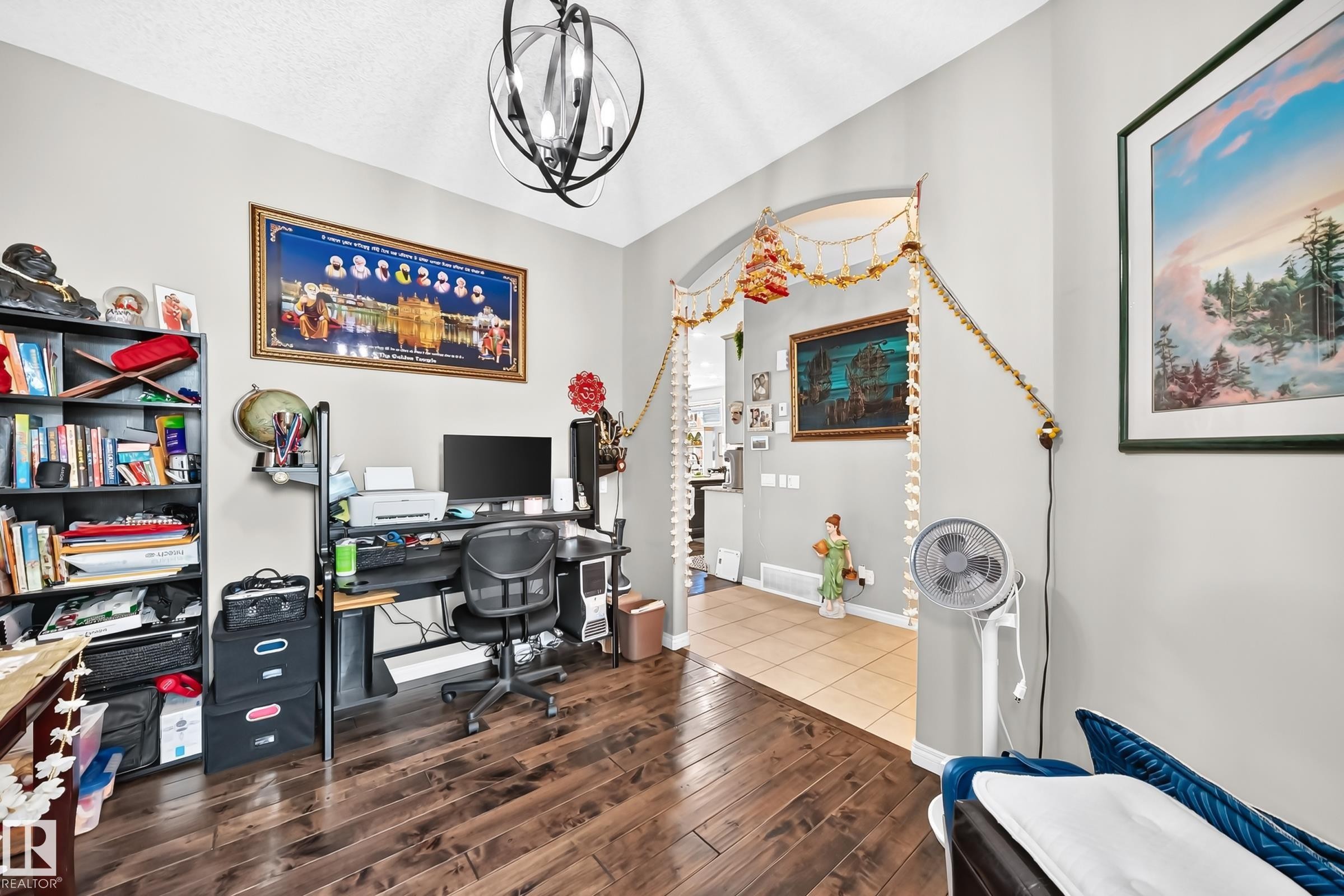 Interior room featuring dark wood-finish flooring and light-toned walls - 12410 171A Avenue, Edmonton, AB