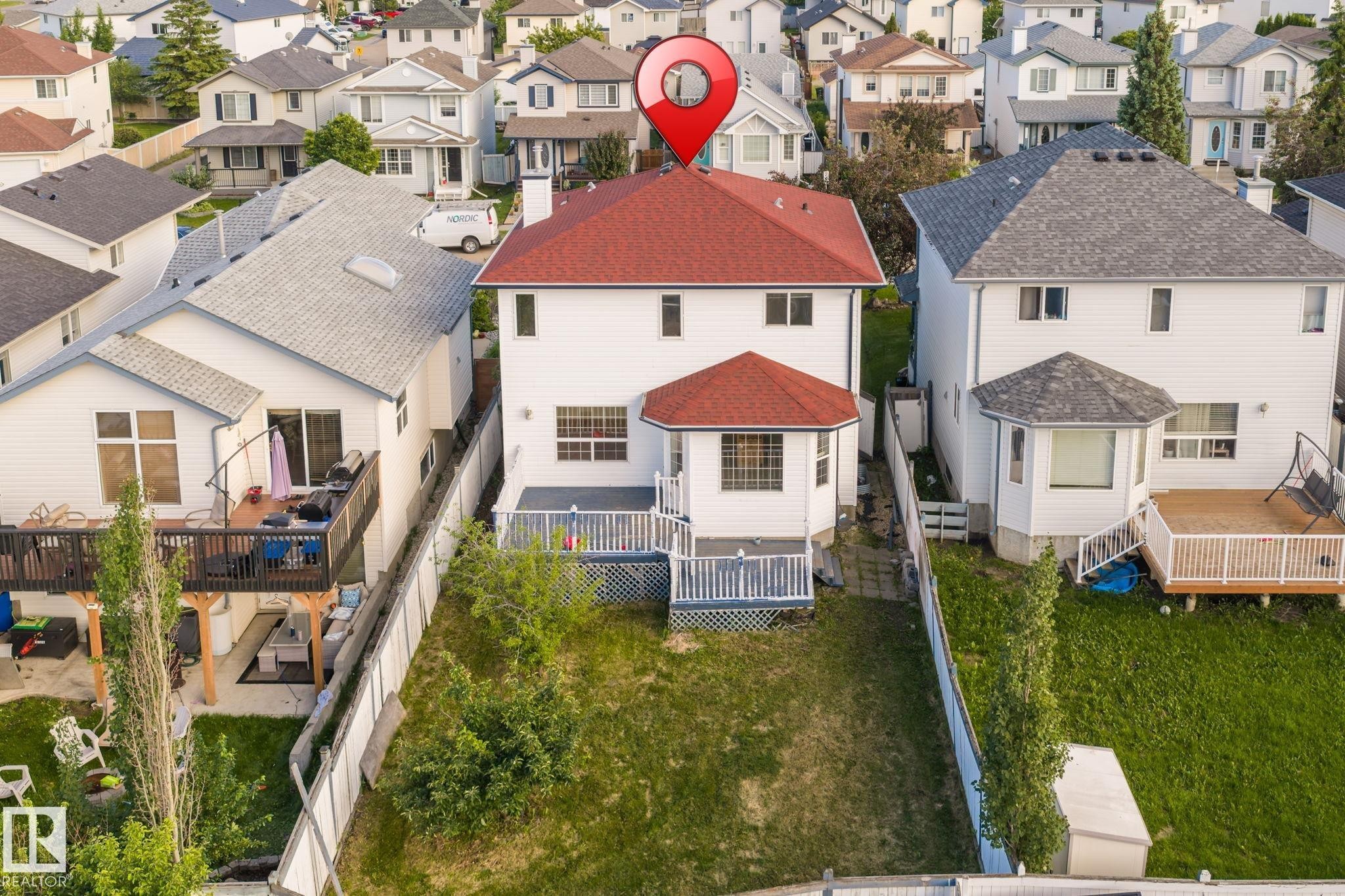 White exterior with a red shingle roof - 1906 37B Av Nw, Edmonton, AB - Outdoor