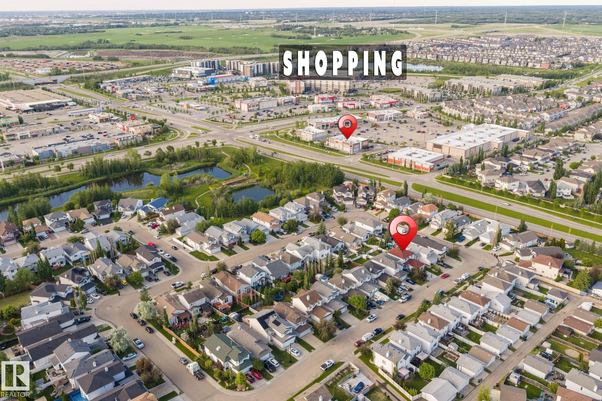Aerial perspective of a residential neighborhood with varied housing styles - 1906 37B Av Nw, Edmonton, AB - Outdoor With View