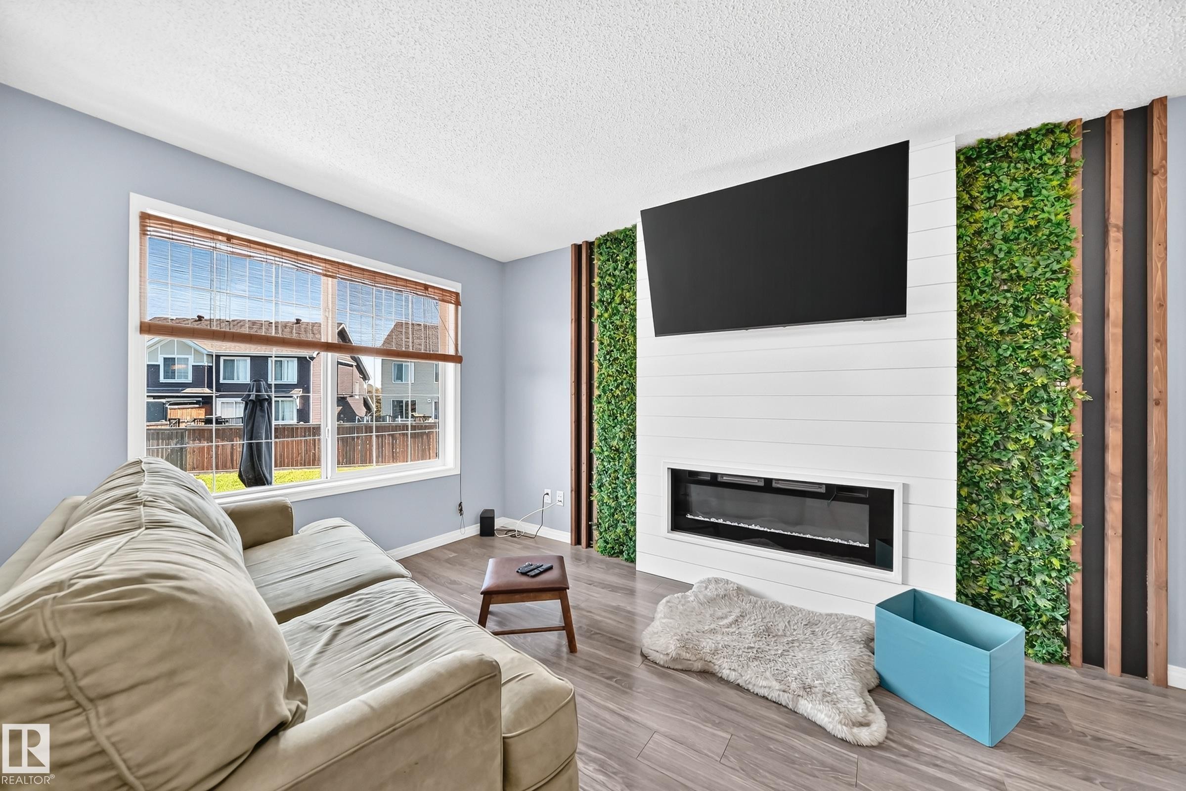 2305 68 Street Sw, Edmonton, AB - Indoor Photo Showing Living Room With Fireplace