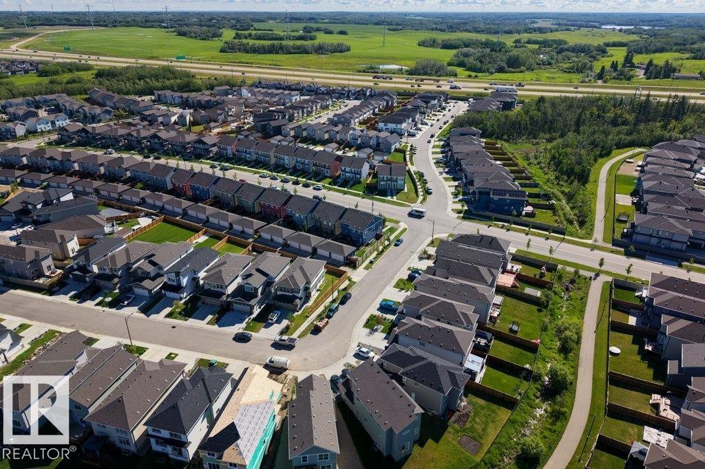 Aerial perspective of a developed residential community with diverse home exteriors - 2116 Maple Road, Edmonton, AB