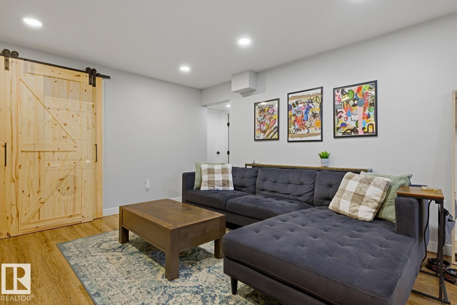 Well lit, open-concept living space with recessed LED lighting - 10328 73 Street, Edmonton, AB