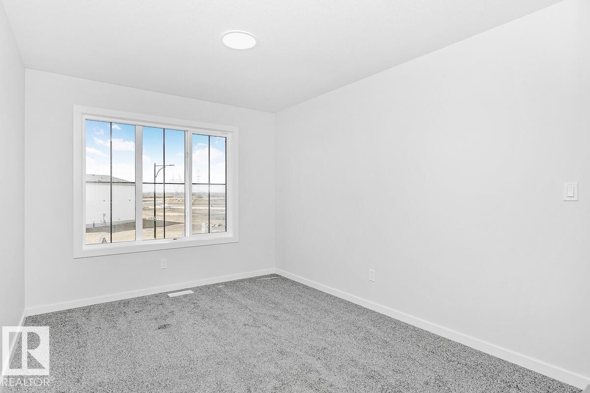 2431 Egret Loop Nw, Edmonton, AB - Indoor Photo Showing Other Room