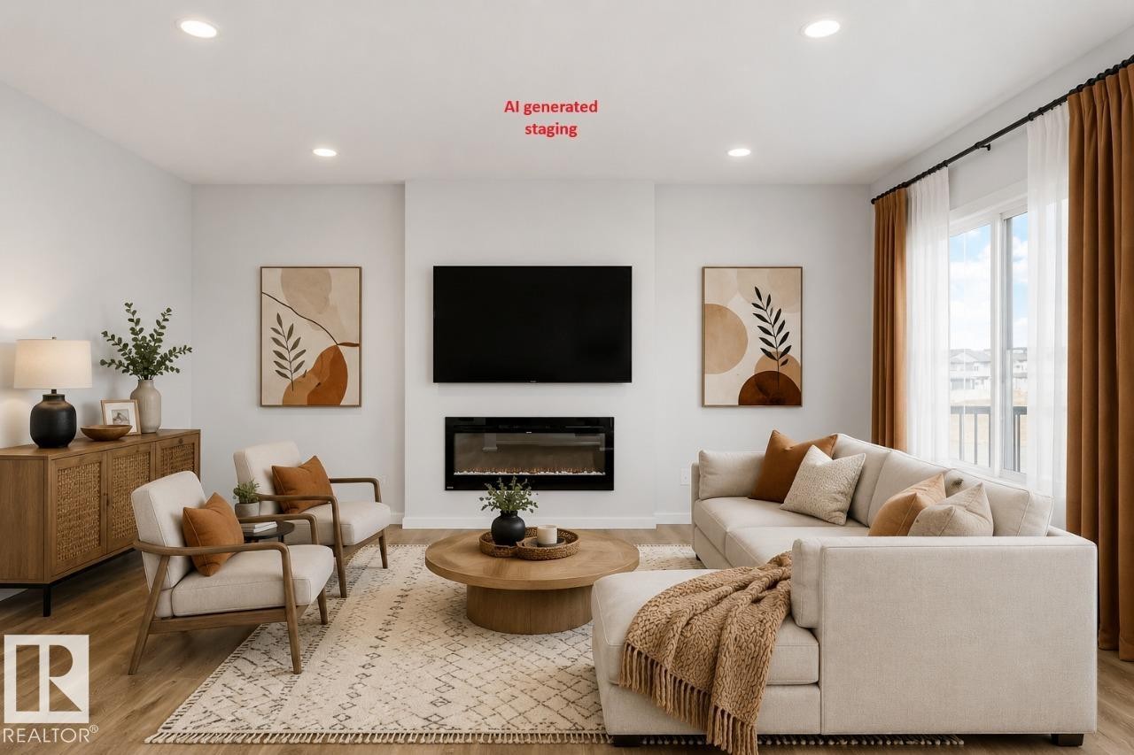 2431 Egret Loop Nw, Edmonton, AB - Indoor Photo Showing Living Room With Fireplace