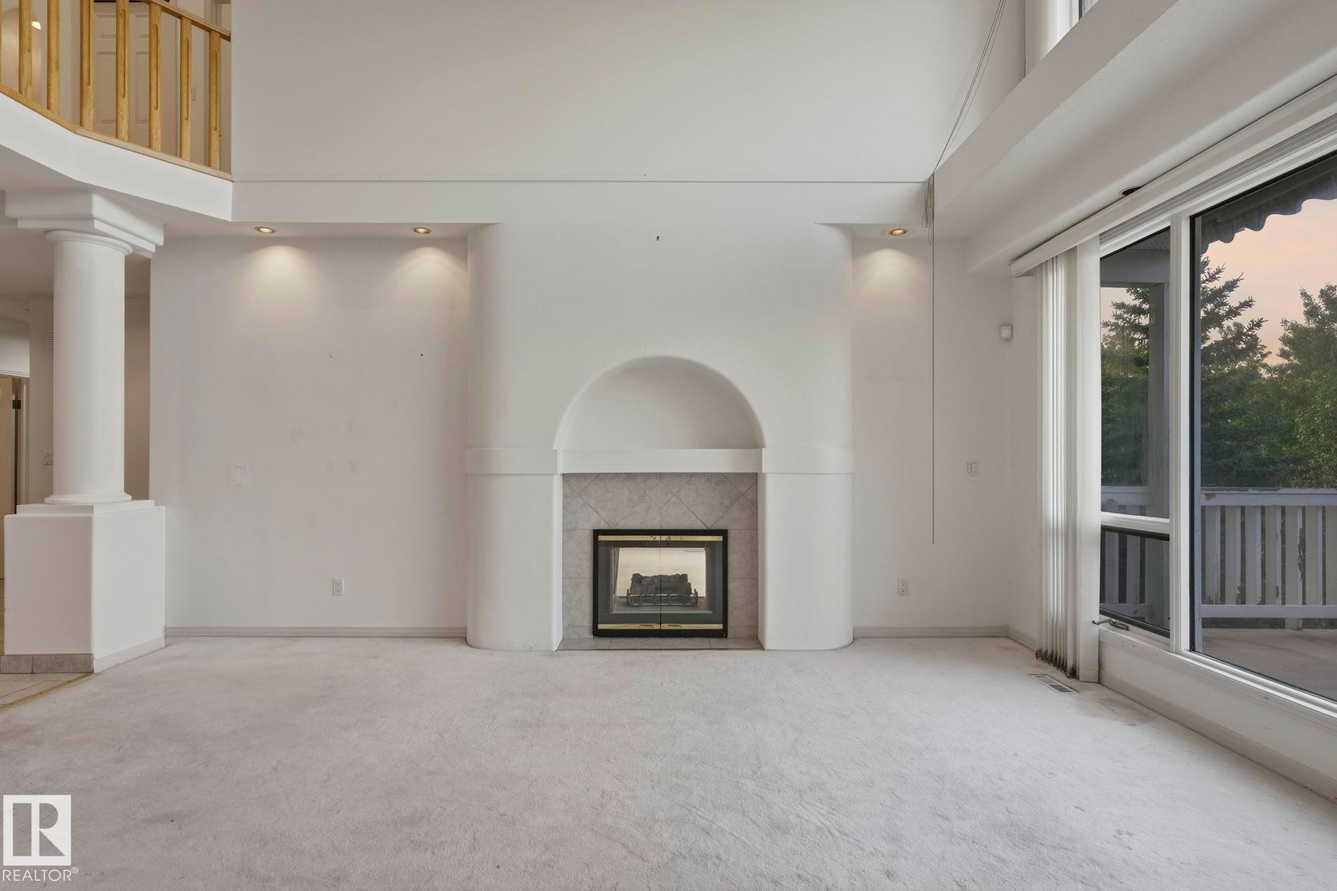 154 Osland Drive Nw, Edmonton, AB - Indoor With Fireplace