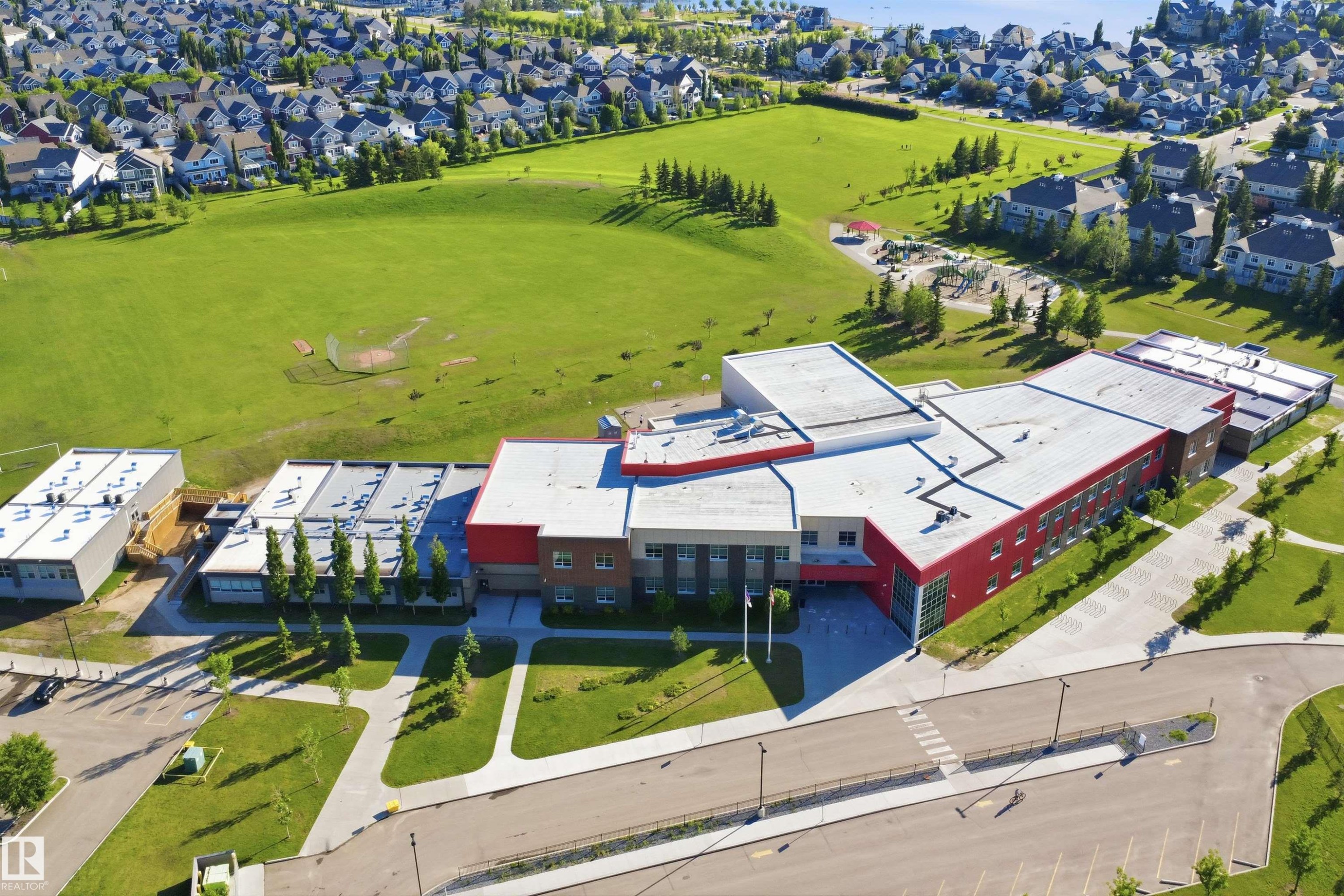 Modern institutional building featuring a multi-wing design and flat rooflines - 95 3040 Spence Wynd, Edmonton, AB