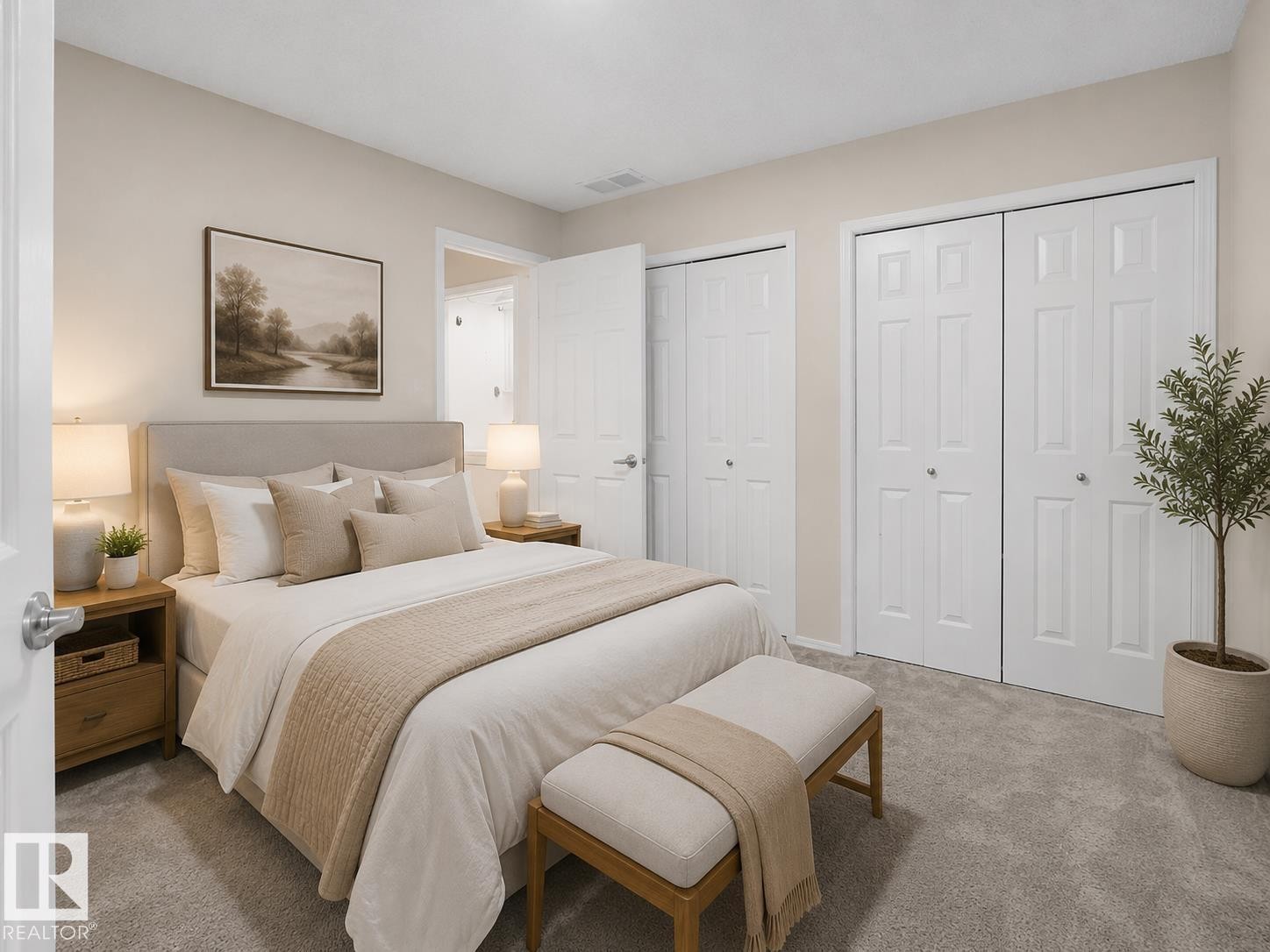 Bedroom featuring neutral wall colors, soft gray carpeting, and multiple white bi-fold closet doors - 1855 Mill Woods Rd E Nw, Edmonton, AB